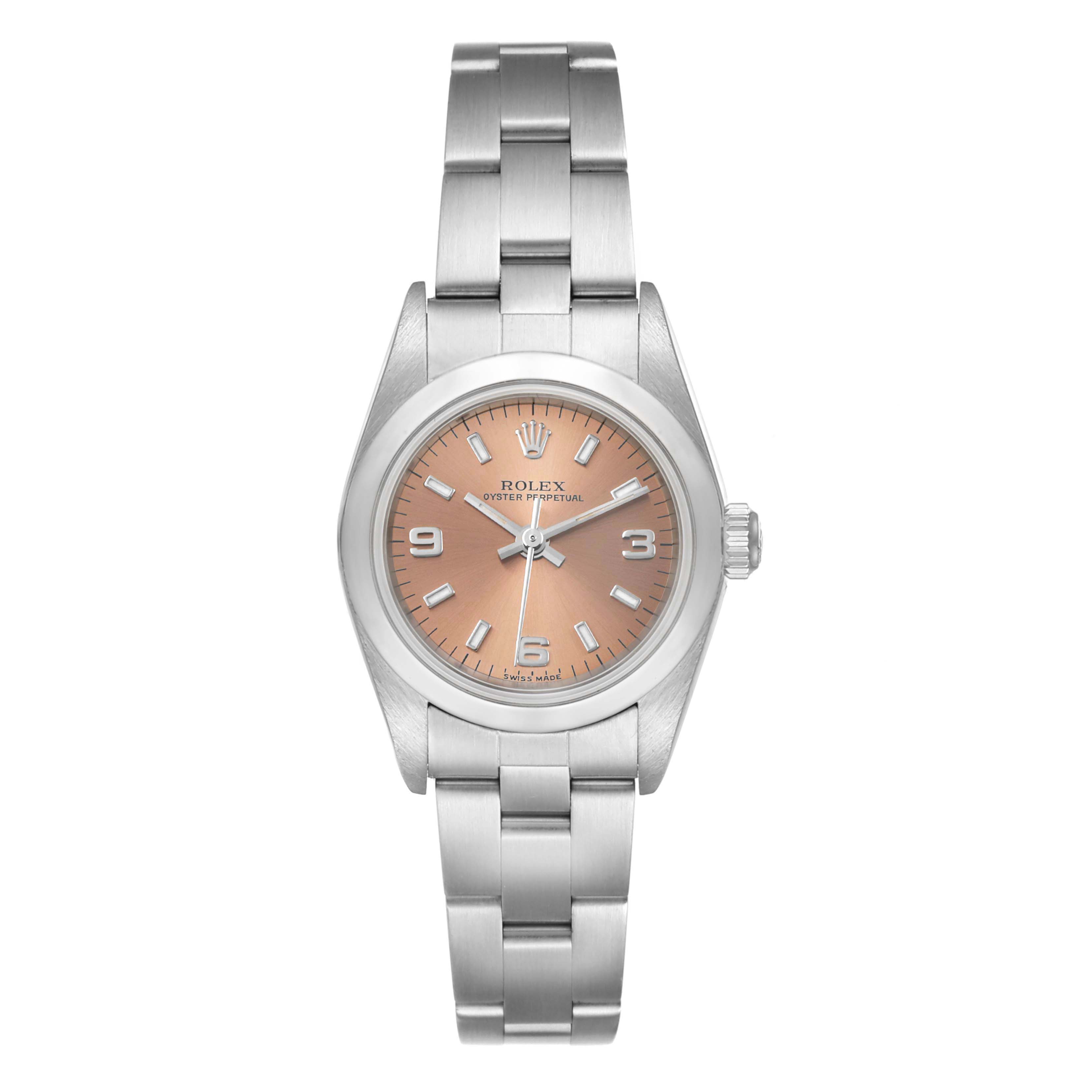 The image shows a front view of a Rolex Oyster Perpetual 76080 Women's Stainless Steel Pink Dial 76080 Women's Stainless Steel Pink Dial watch with a silver bracelet and a salmon-colored dial.