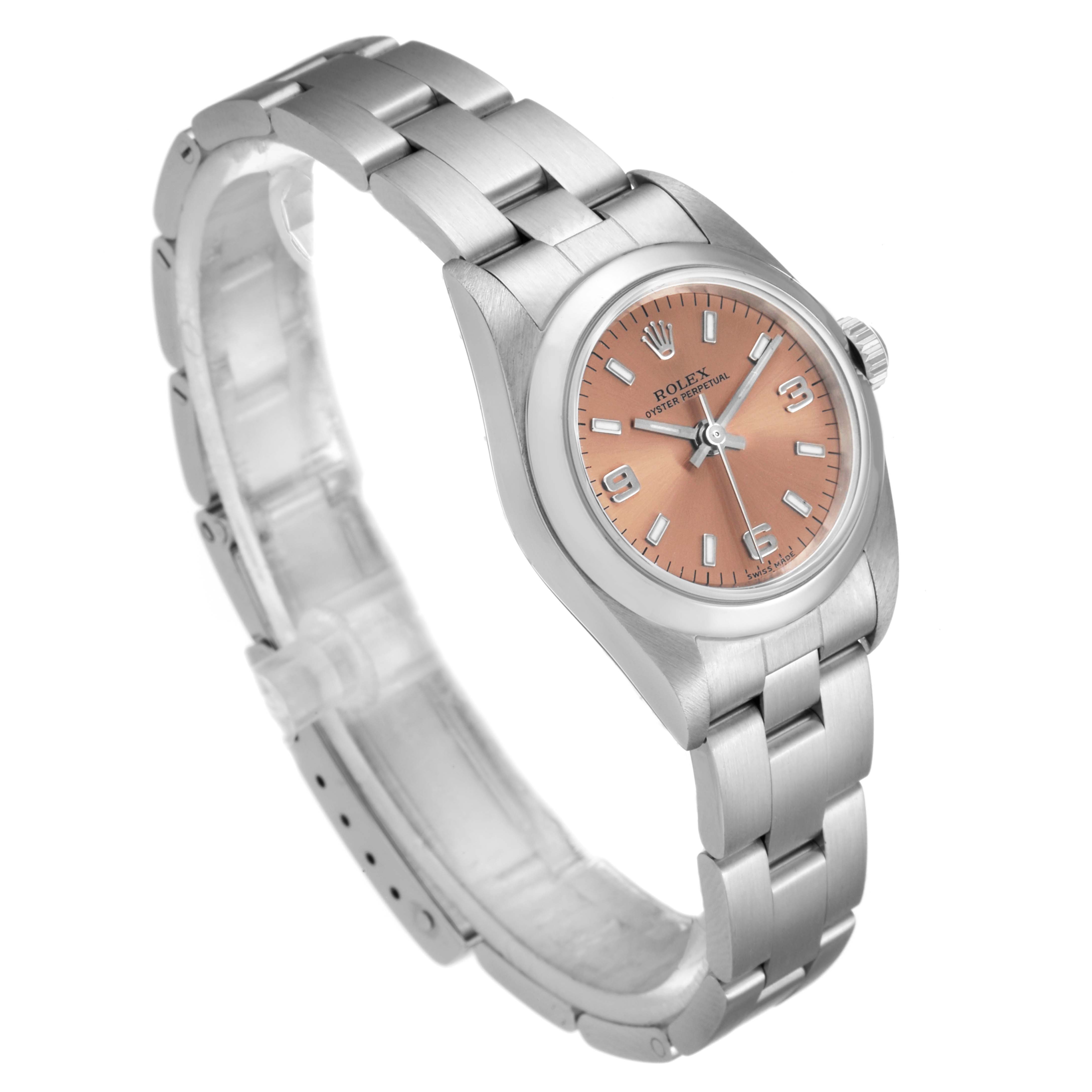 The image shows a Rolex Oyster Perpetual 76080 Women's Stainless Steel Pink Dial 76080 Women's Stainless Steel Pink Dial watch from a three-quarter top angle, displaying the bracelet, case, dial, and crown.