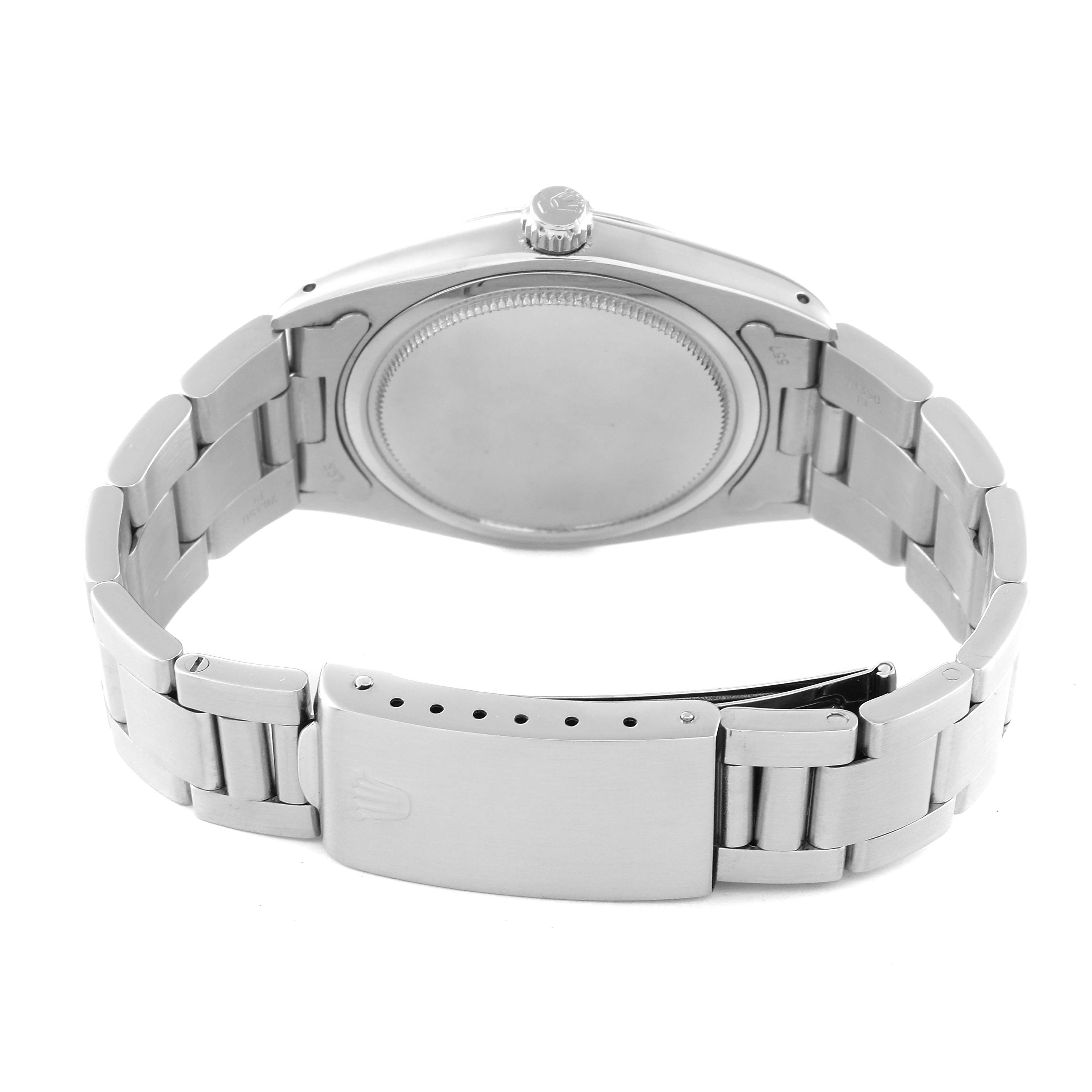 The image shows the back and clasp of a Rolex Vintage Collection 6694 Men's Stainless Steel Silver Dial 6694 Men's Stainless Steel Silver Dial model, highlighting its stainless steel bracelet.
