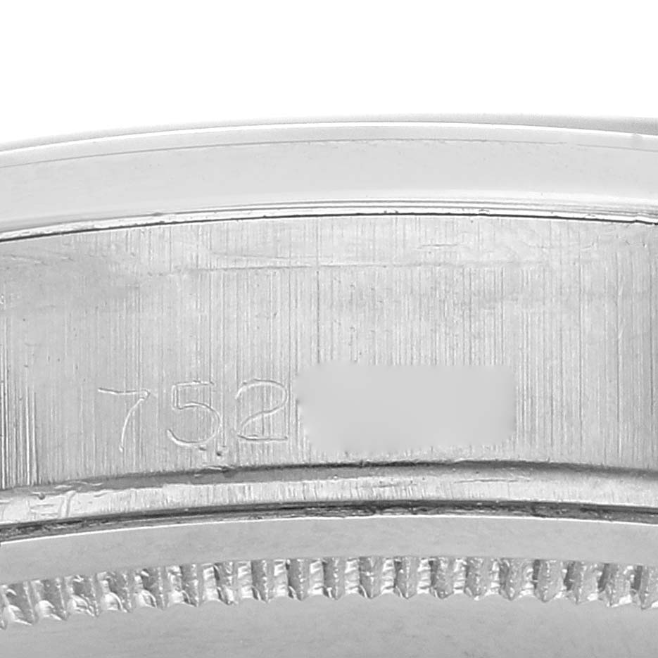 The image shows a close-up of the side of the case of a Vintage Collection Rolex watch, focusing on the engraved model number.