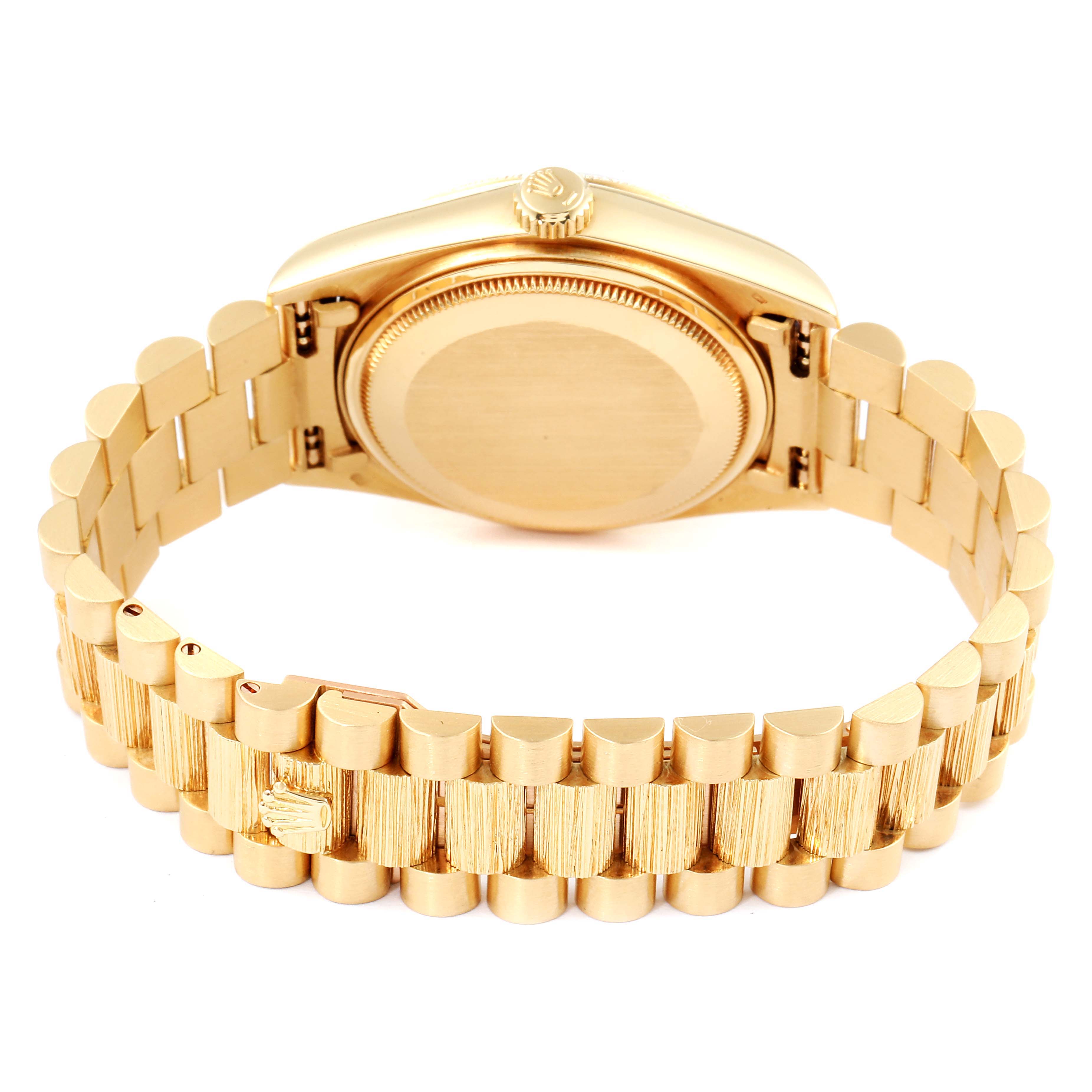 This image shows the back side and bracelet of a Rolex President 18078 Men's Yellow Gold Silver Dial 18078 Men's Yellow Gold Silver Dial model watch.