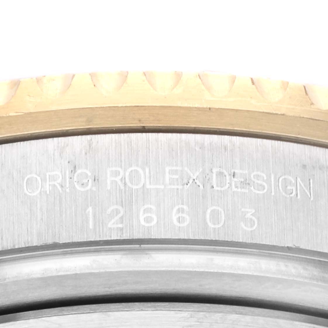 This image shows a close-up view of the bezel and case side of a Rolex Sea-Dweller 126603 Men's Steel and Gold (two tone) Black Dial 126603 Men's Steel and Gold (two tone) Black Dial with model number 126603.