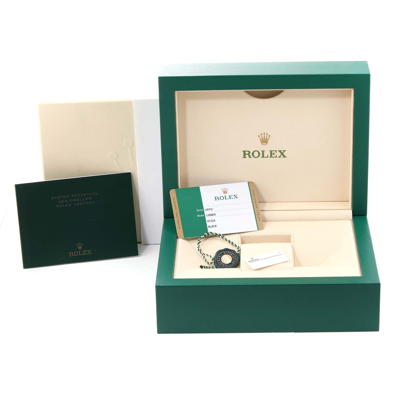 This image shows the open box, certification card, booklet, and tags for the Rolex Sea-Dweller 126603 Men's Steel and Gold (two tone) Black Dial 126603 Men's Steel and Gold (two tone) Black Dial watch.