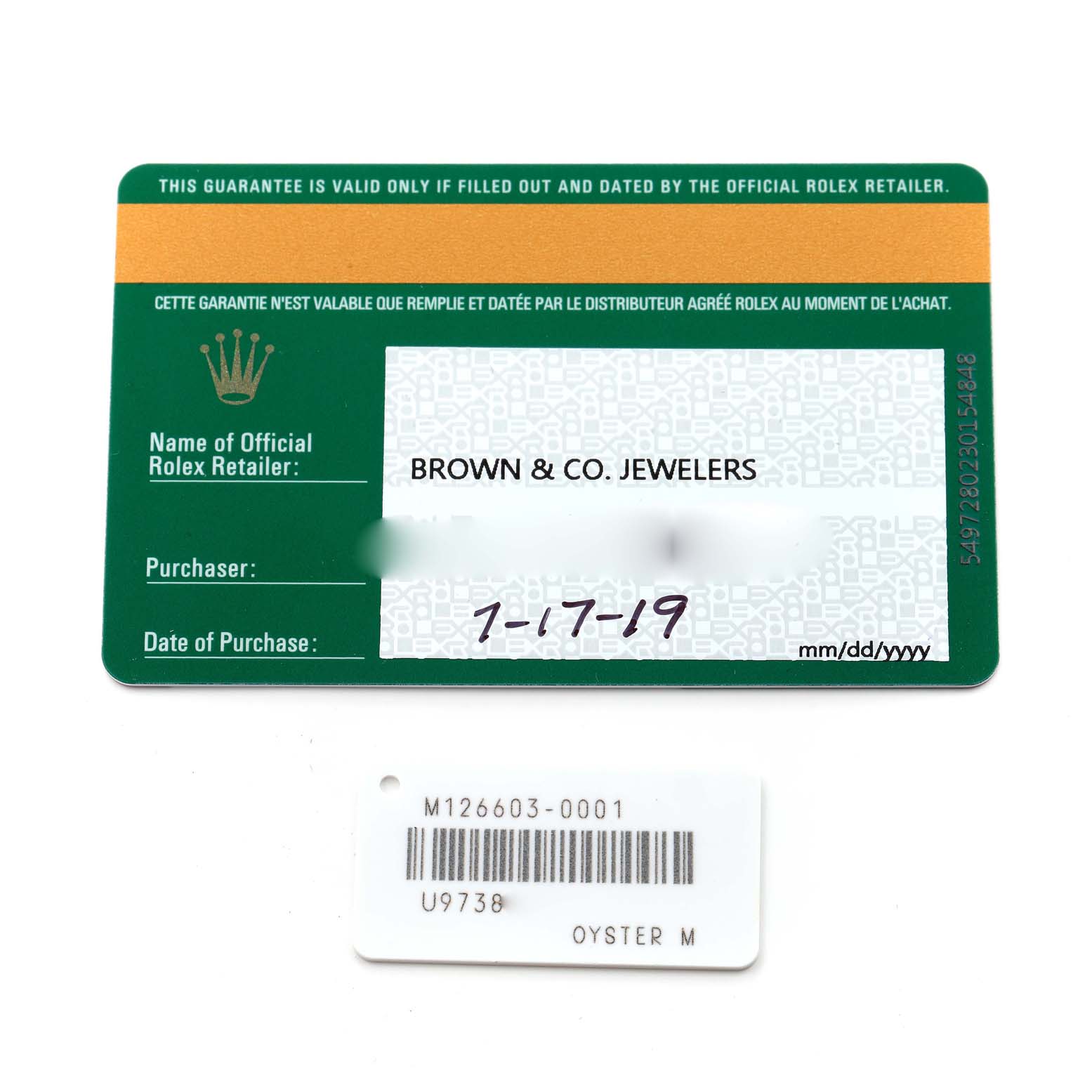 The image shows the warranty card and tag for the Rolex Sea-Dweller 126603 Men's Steel and Gold (two tone) Black Dial 126603 Men's Steel and Gold (two tone) Black Dial model, including purchase information.