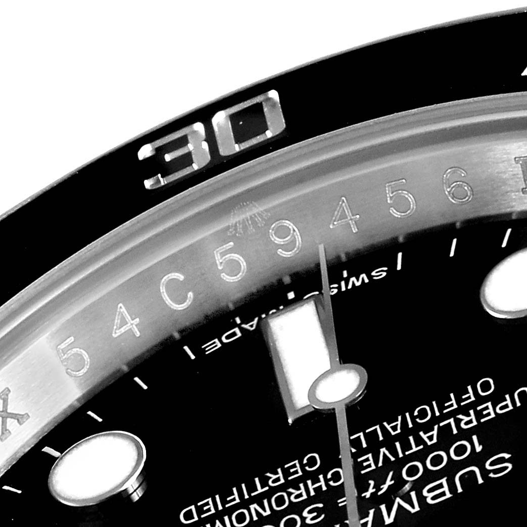 The image shows a close-up of the dial and bezel of a Rolex Submariner 116610 Men
s Stainless Steel Black Dial 116610 Men
s Stainless Steel Black Dial watch.