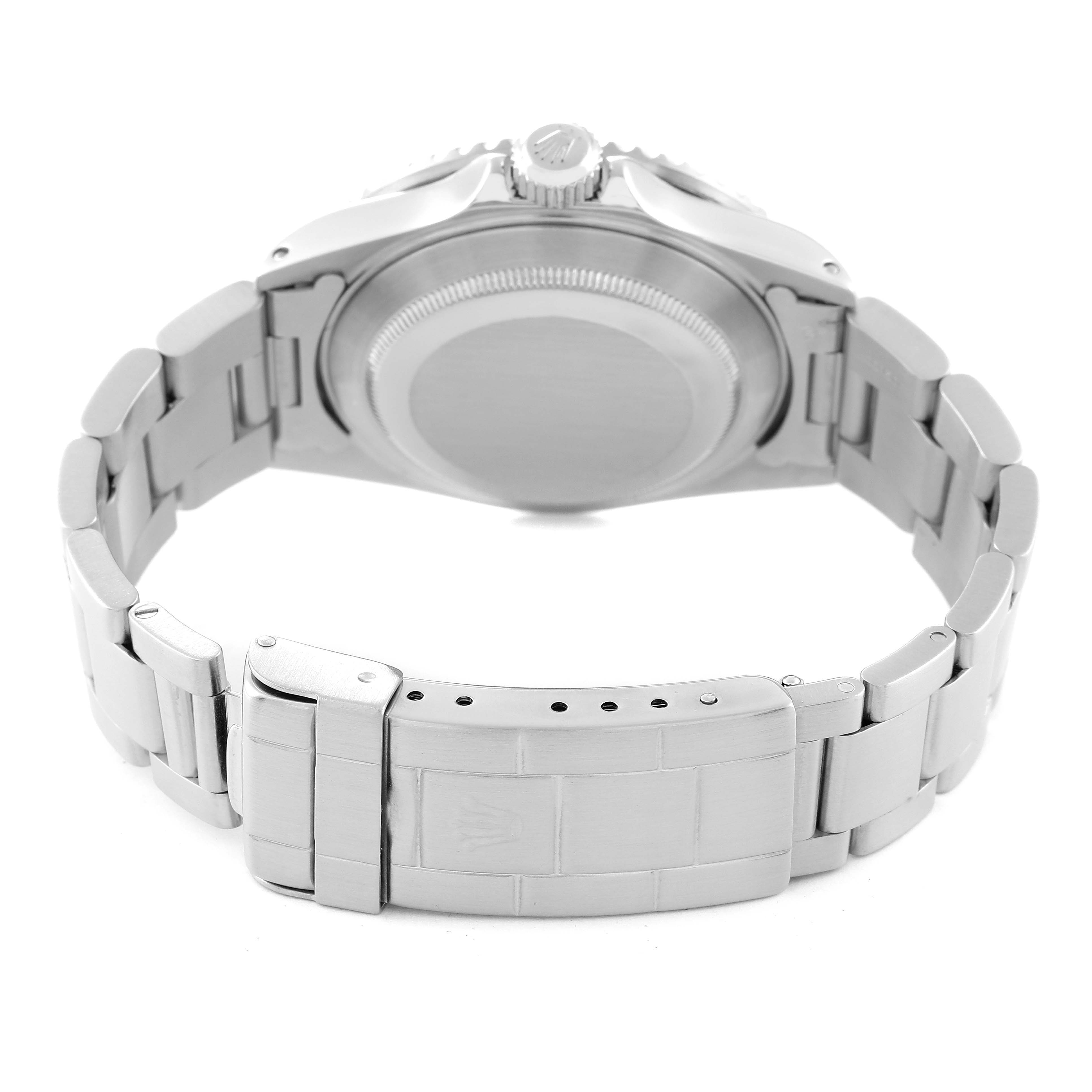 This image shows the backside of a Rolex Submariner 16610 Men
s Stainless Steel Black Dial 16610 Men
s Stainless Steel Black Dial, highlighting its case back, bracelet, and clasp.