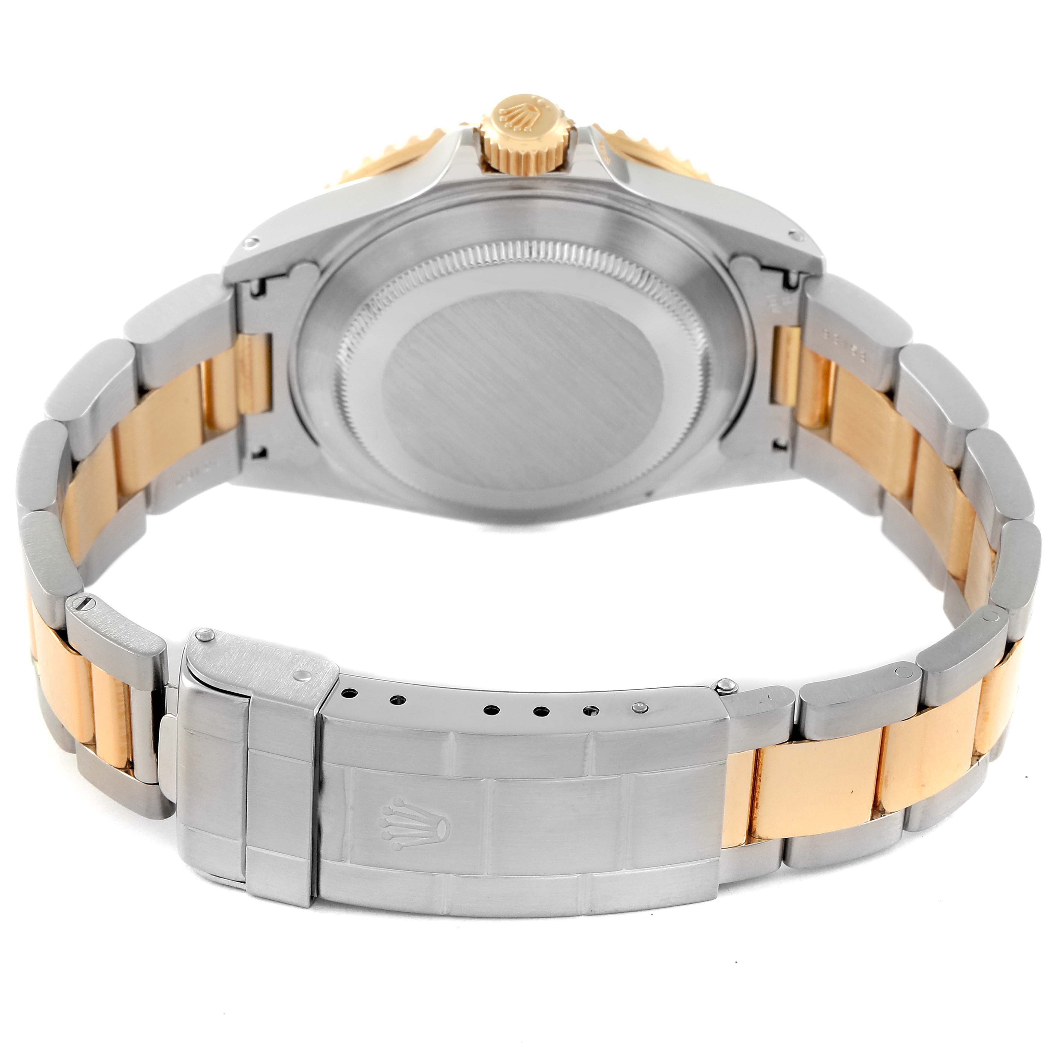 The image shows the case back, bracelet, and clasp of a Rolex Submariner 16613 Men's Steel and Gold (two tone) Champagne Dial 16613 Men's Steel and Gold (two tone) Champagne Dial watch.