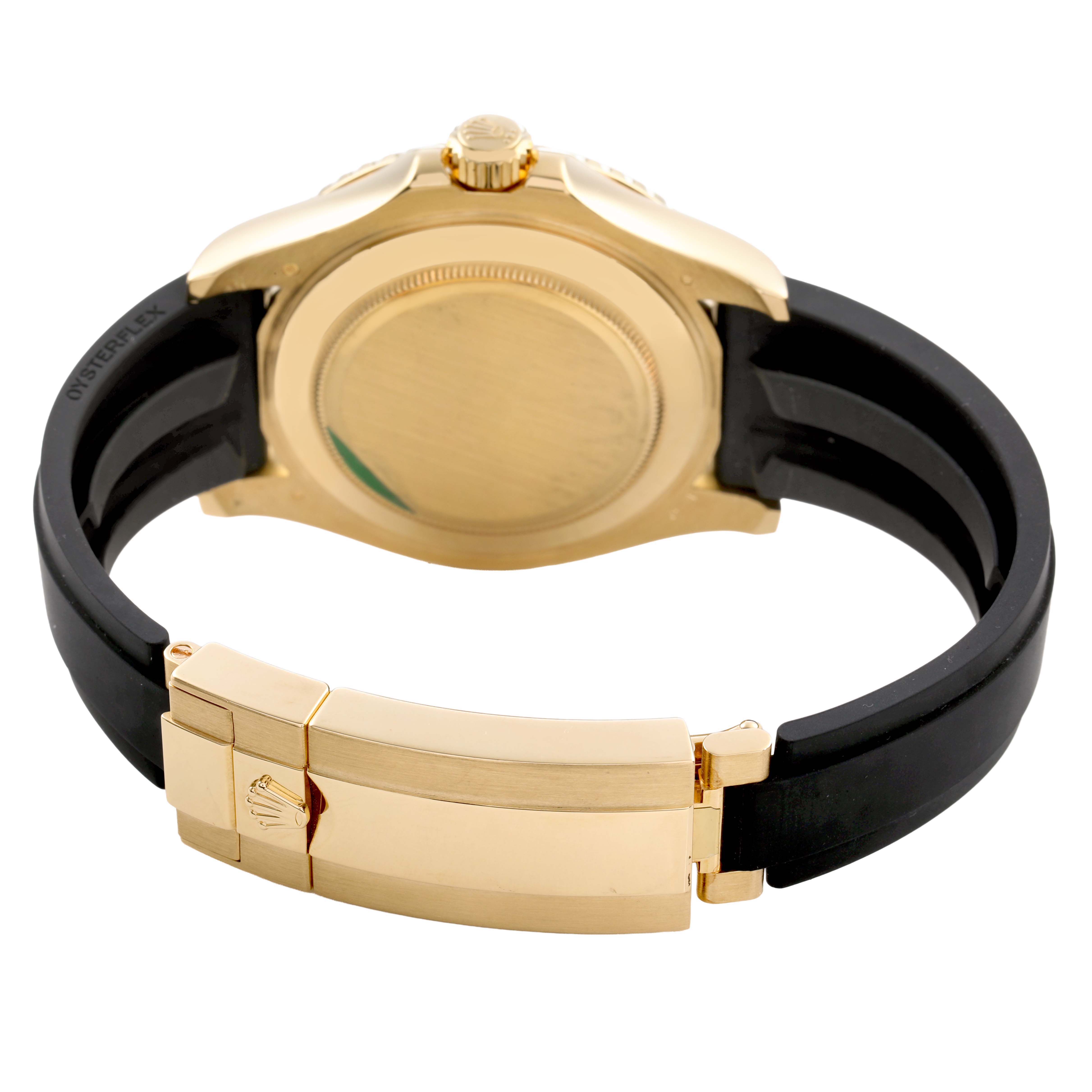 The Rolex Yacht-Master 226658 Men's Yellow Gold Beige Dial is shown from the side revealing the back case, crown, clasp, and rubber strap.