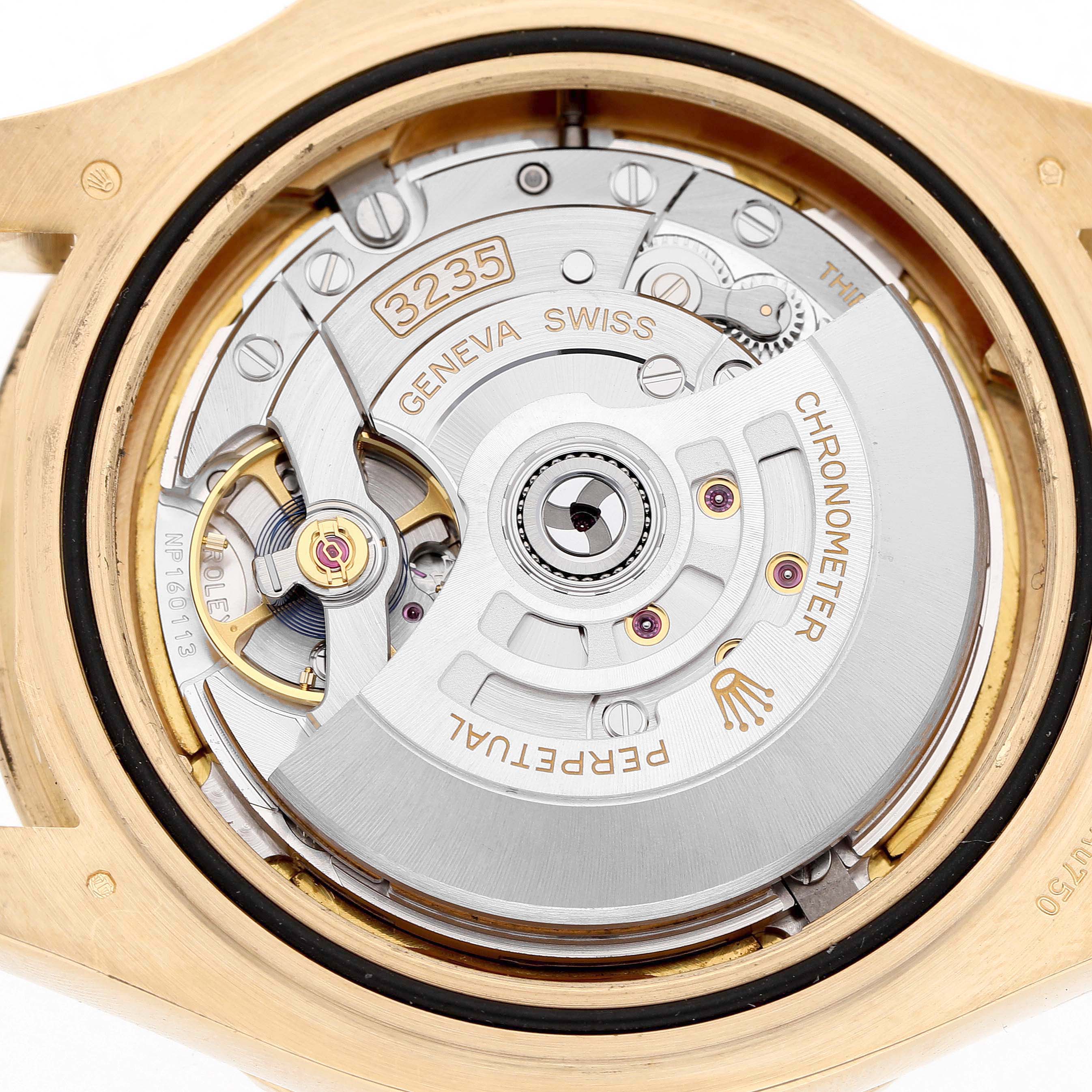 The image shows the back view of the Rolex Yacht-Master 226658 Men's Yellow Gold Beige Dial, focusing on its movement and internal mechanisms.