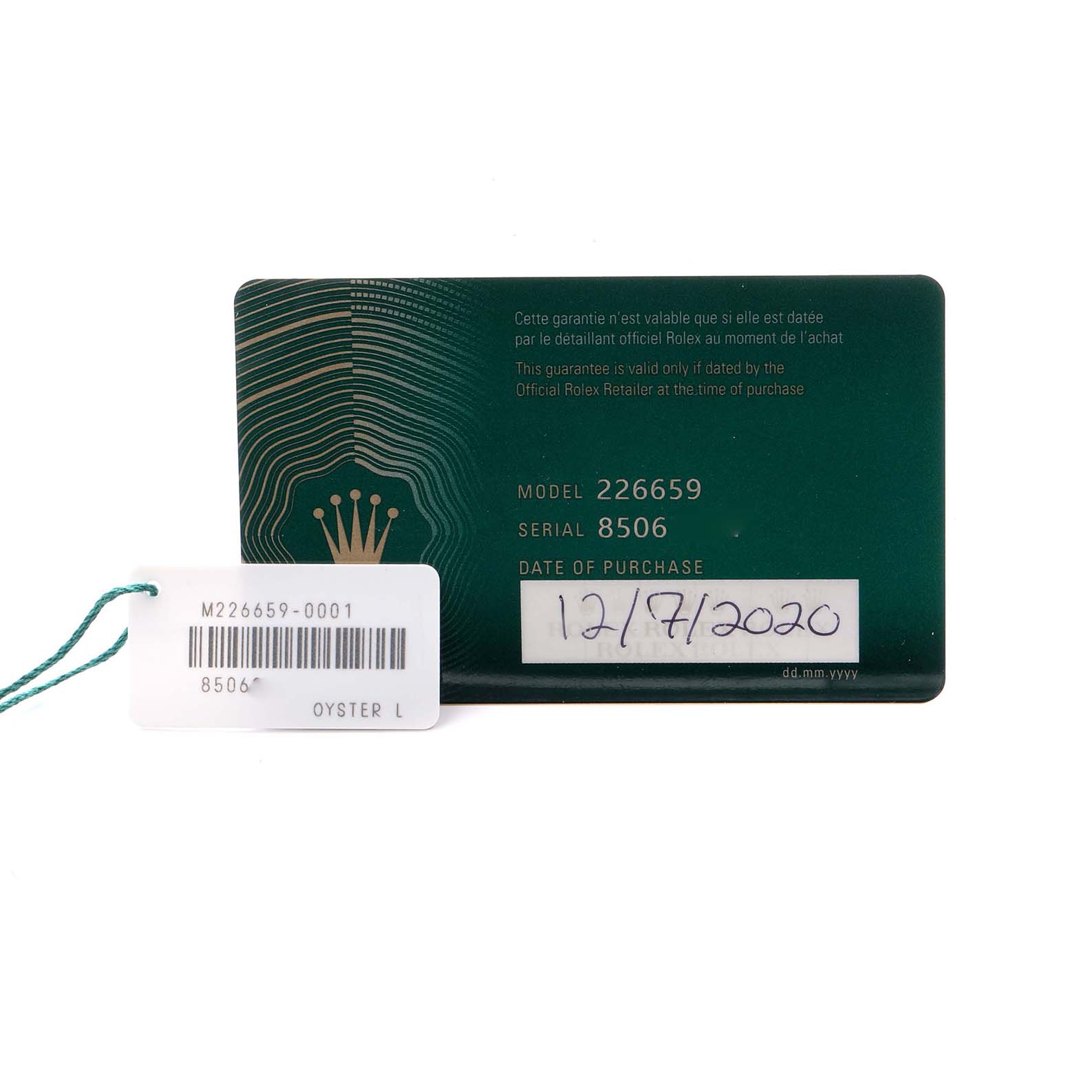 The image shows a warranty card and tag for the Rolex Yacht-Master 226659 Men
s White Gold Black Dial 226659 Men
s White Gold Black Dial model 226659.