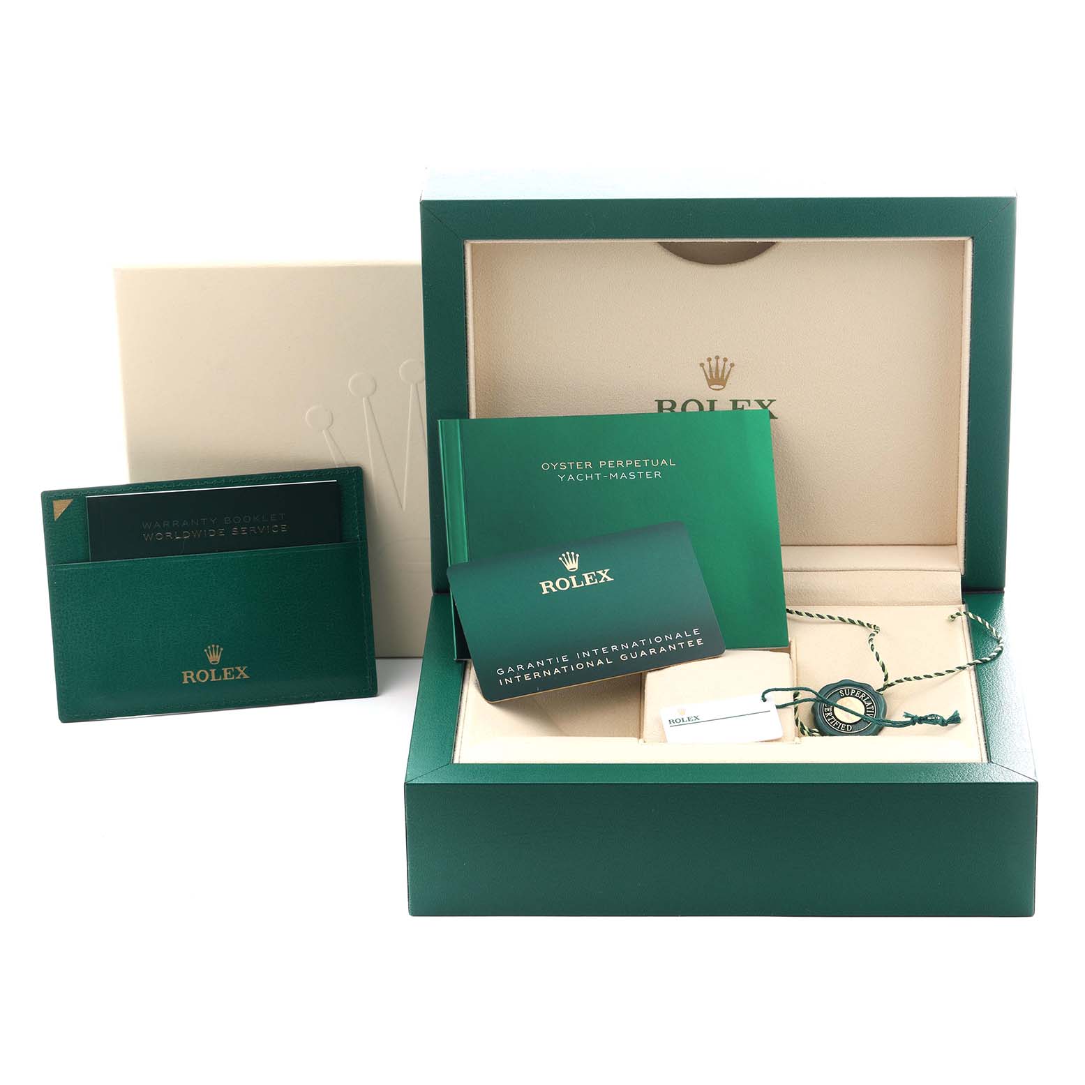 The image shows the packaging and accessories of the Rolex Yacht-Master 226659 Men
s White Gold Black Dial 226659 Men
s White Gold Black Dial, including the box, warranty card, and booklet.