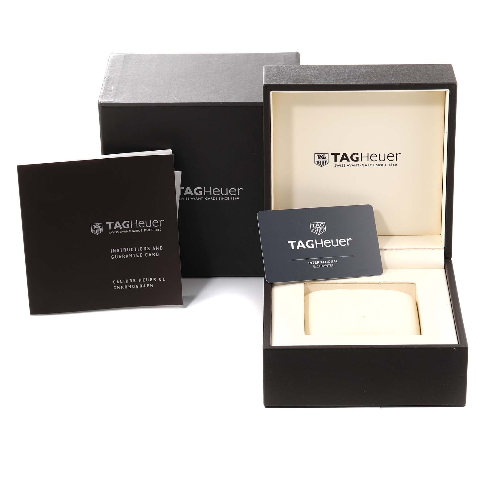 The image shows the packaging, instructions, and guarantee card for the Tag Heuer Carrera CAR2A8A.BF0707 Men's Titanium Grey Dial CAR2A8A.BF0707 Men's Titanium Grey Dial watch.