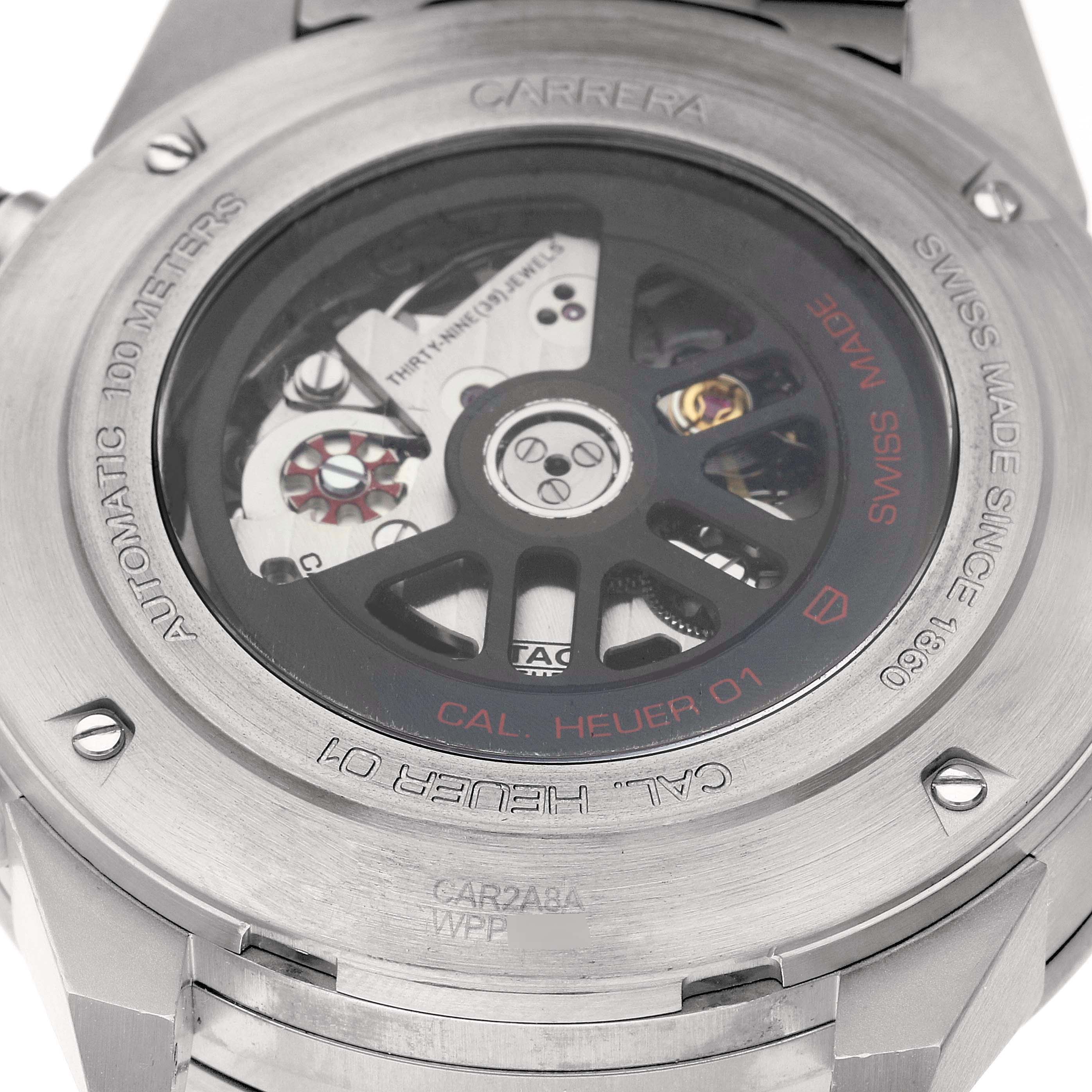 The image shows the back view of the Tag Heuer Carrera CAR2A8A.BF0707 Men's Titanium Grey Dial CAR2A8A.BF0707 Men's Titanium Grey Dial watch, highlighting its automatic movement and intricate inner workings.