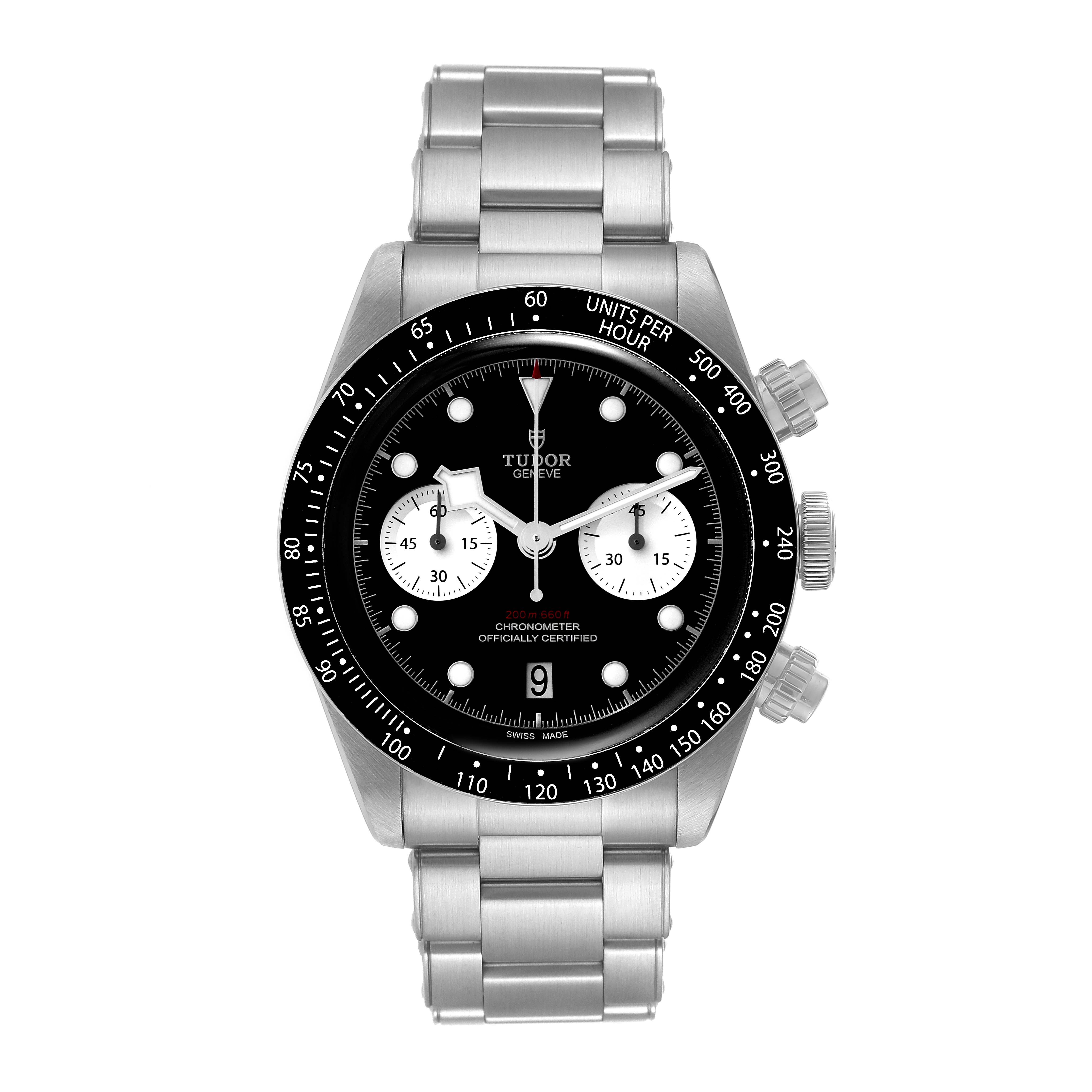 The Tudor Sport Chronograph watch is shown from a top view, displaying its face, bezel, subdials, and stainless steel bracelet.