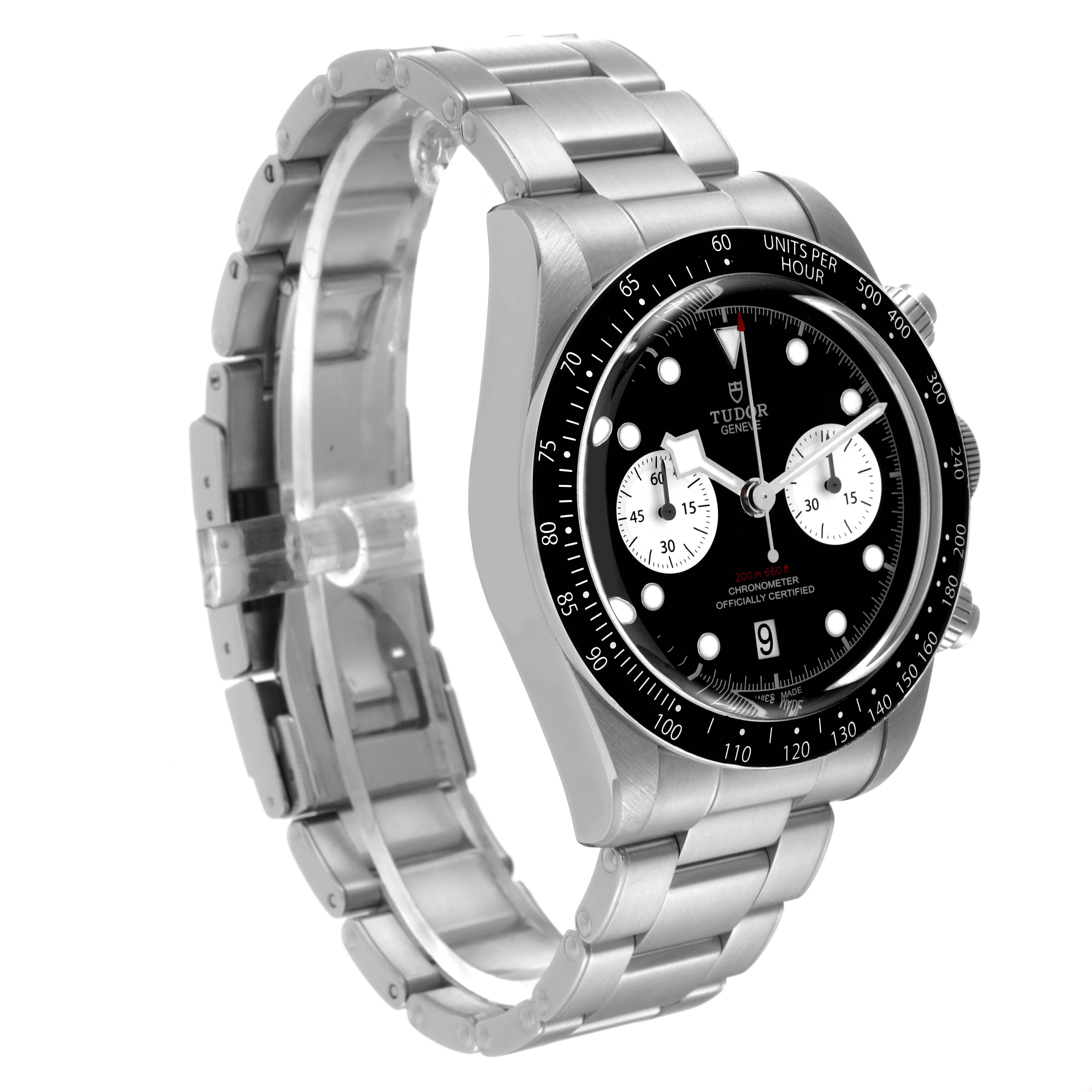 The Tudor Sport Chronograph watch is shown at a slight left side angle, displaying the face, bezel, and stainless steel bracelet.