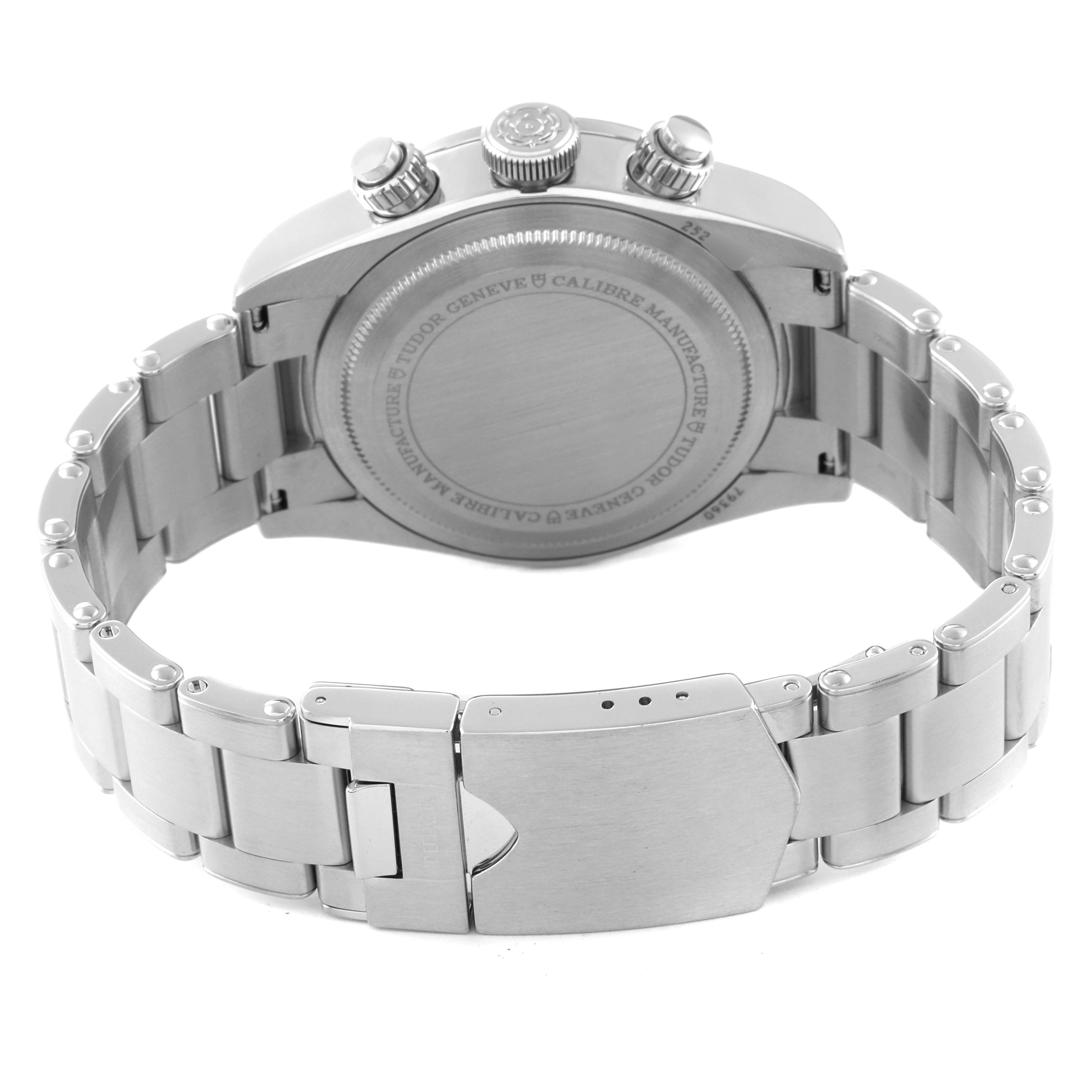 The image shows the back case, bracelet, and clasp of a Tudor Sport Chronograph watch from a rear angle.