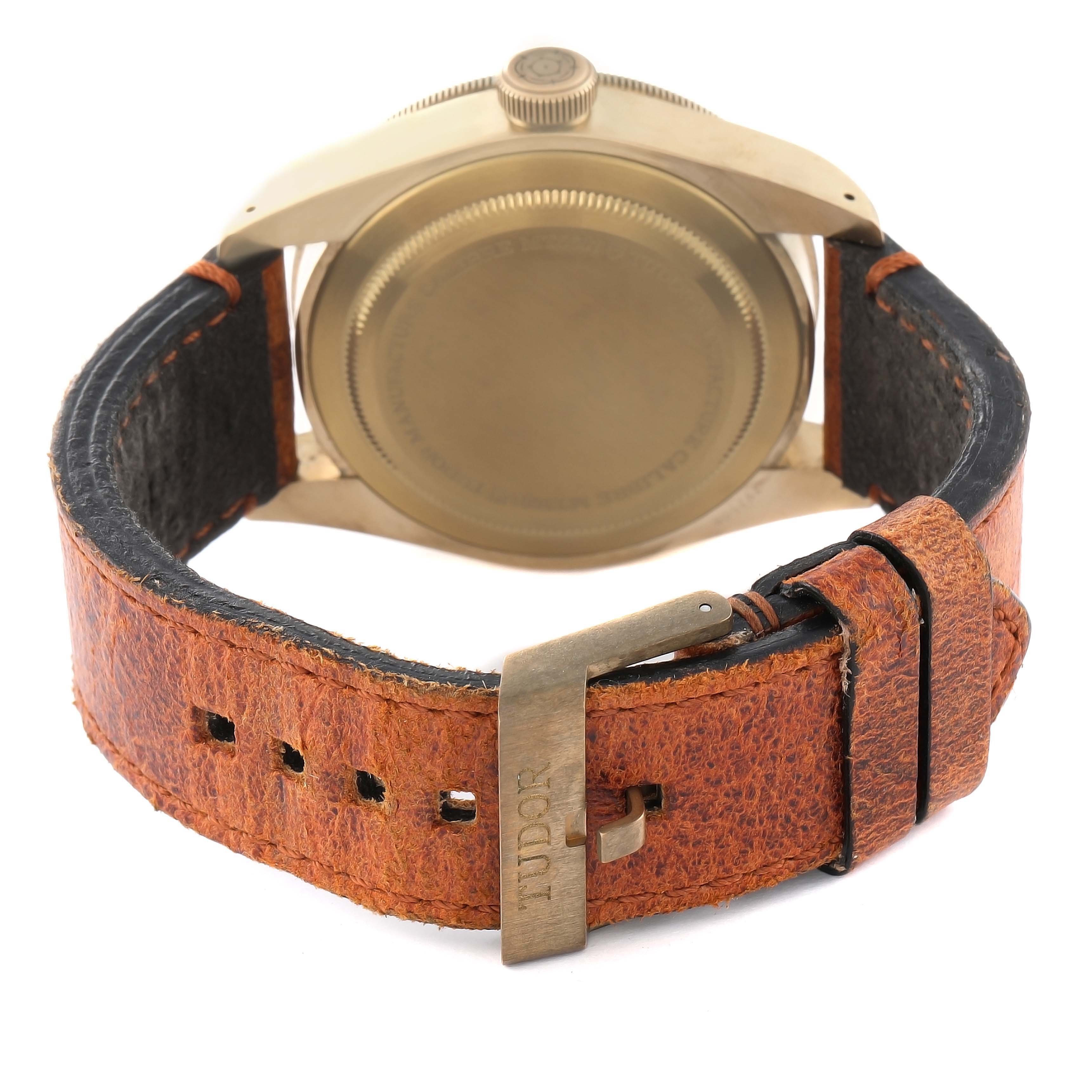 This image shows the back view of the Tudor Heritage Black Bay 79250B Men's Bronze Brown Dial 79250B Men's Bronze Brown Dial watch, highlighting the case back and leather strap with the buckle.