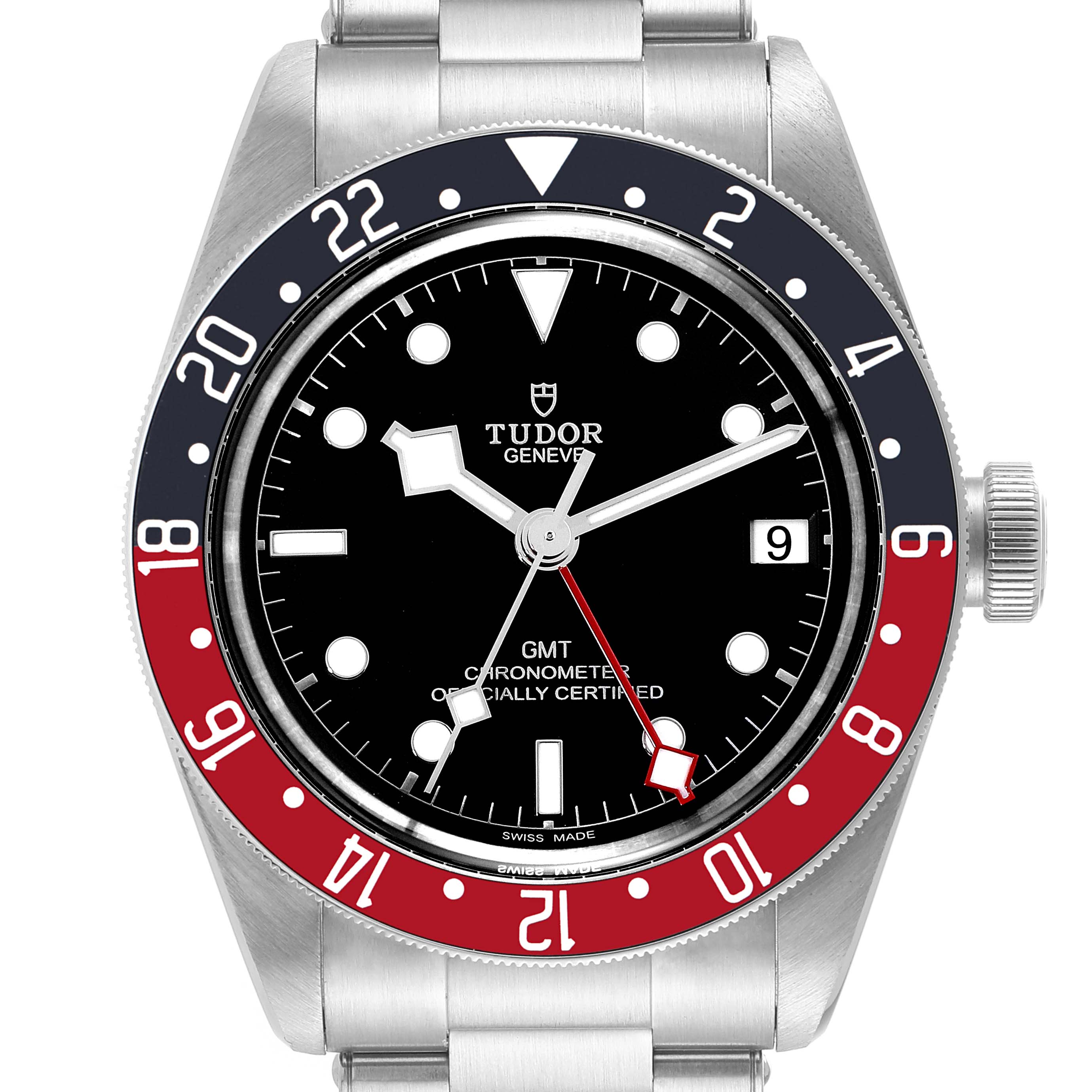 This image shows a front-facing view of the Heritage Black Bay GMT model by Tudor, highlighting the bezel, dial, hands, and date window.