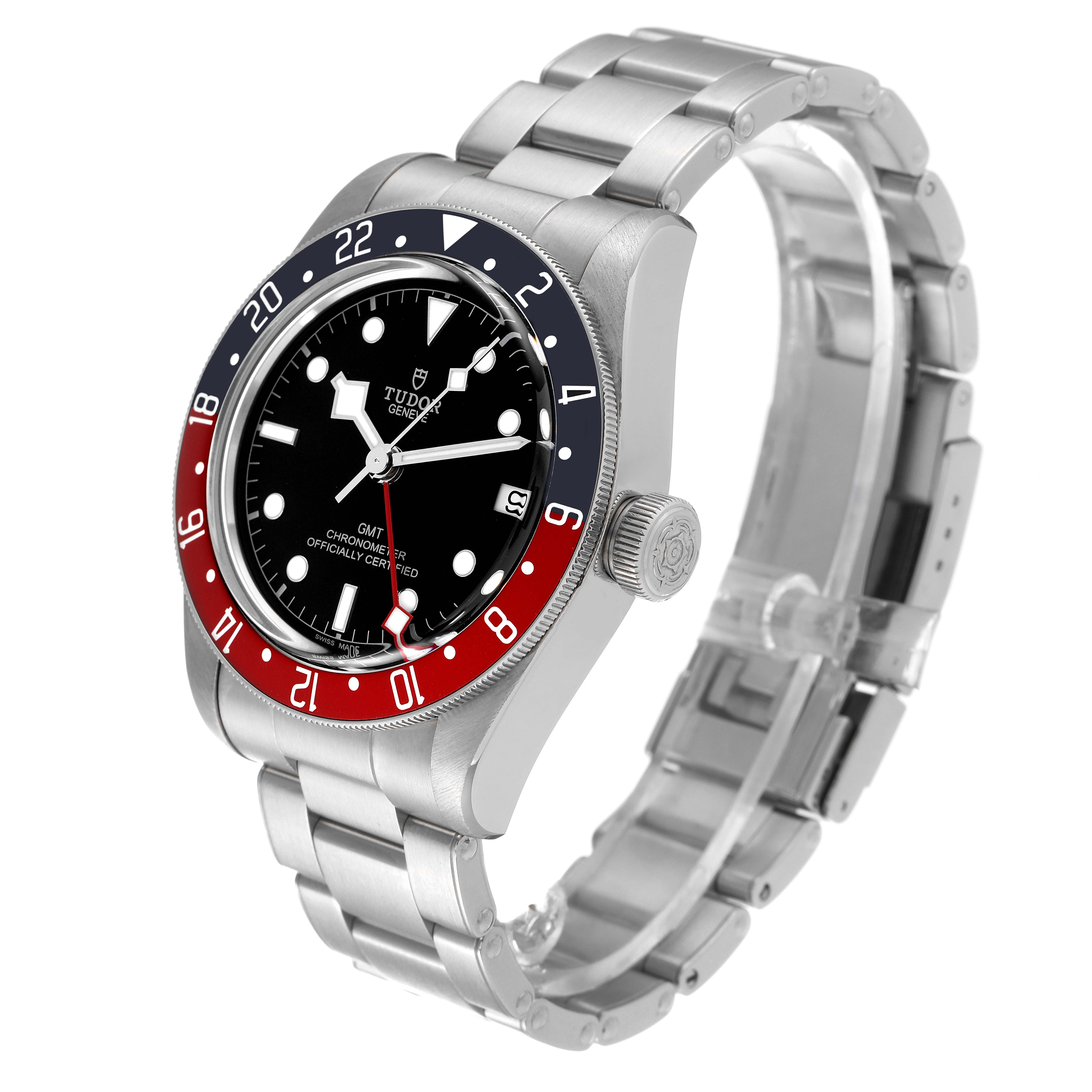 The image shows a Tudor Heritage Black Bay 79830RB Men
s Stainless Steel Black Dial 79830RB Men
s Stainless Steel Black Dial GMT watch angled to display its face, bezel, crown, and part of the bracelet.