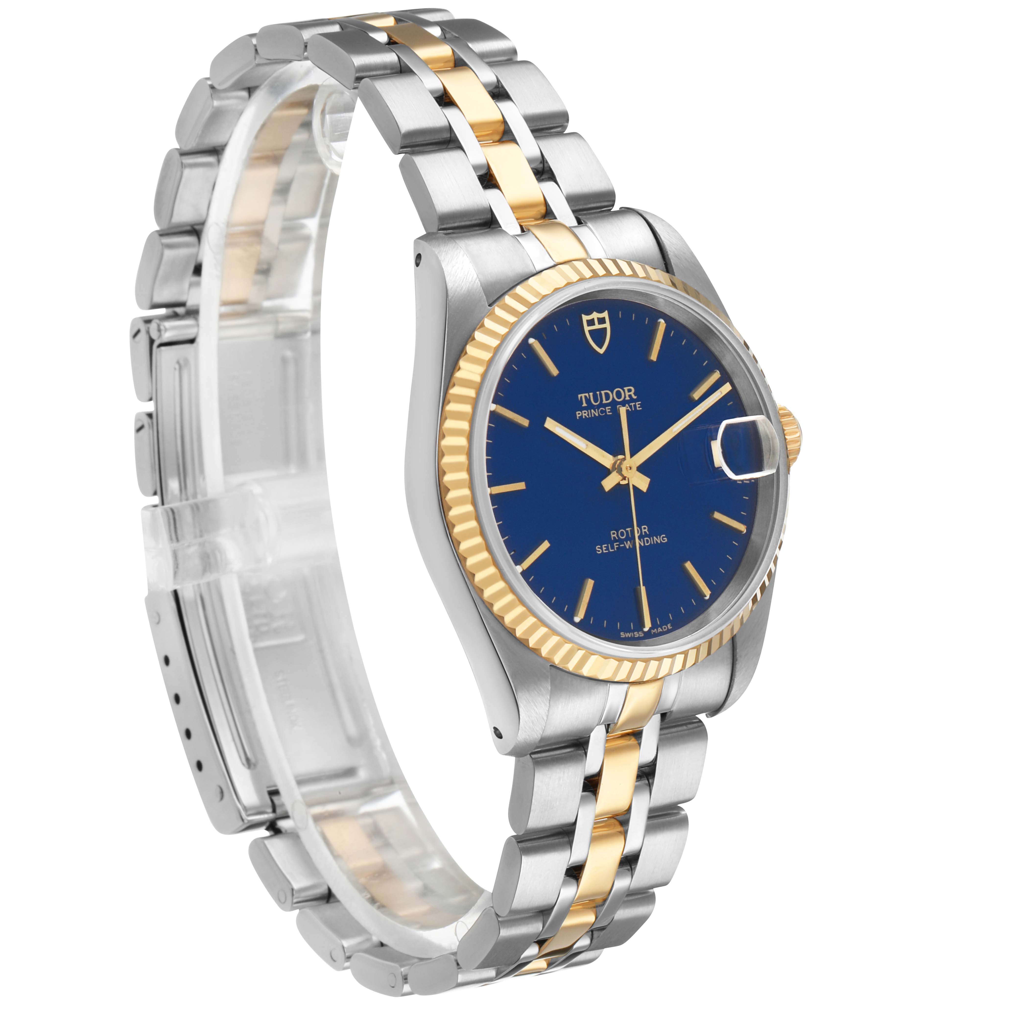 The Tudor Prince 72033 Men's Steel and Gold (two tone) Blue Dial watch is shown at a three-quarter angle, displaying its blue dial, gold bezel, and two-tone bracelet.