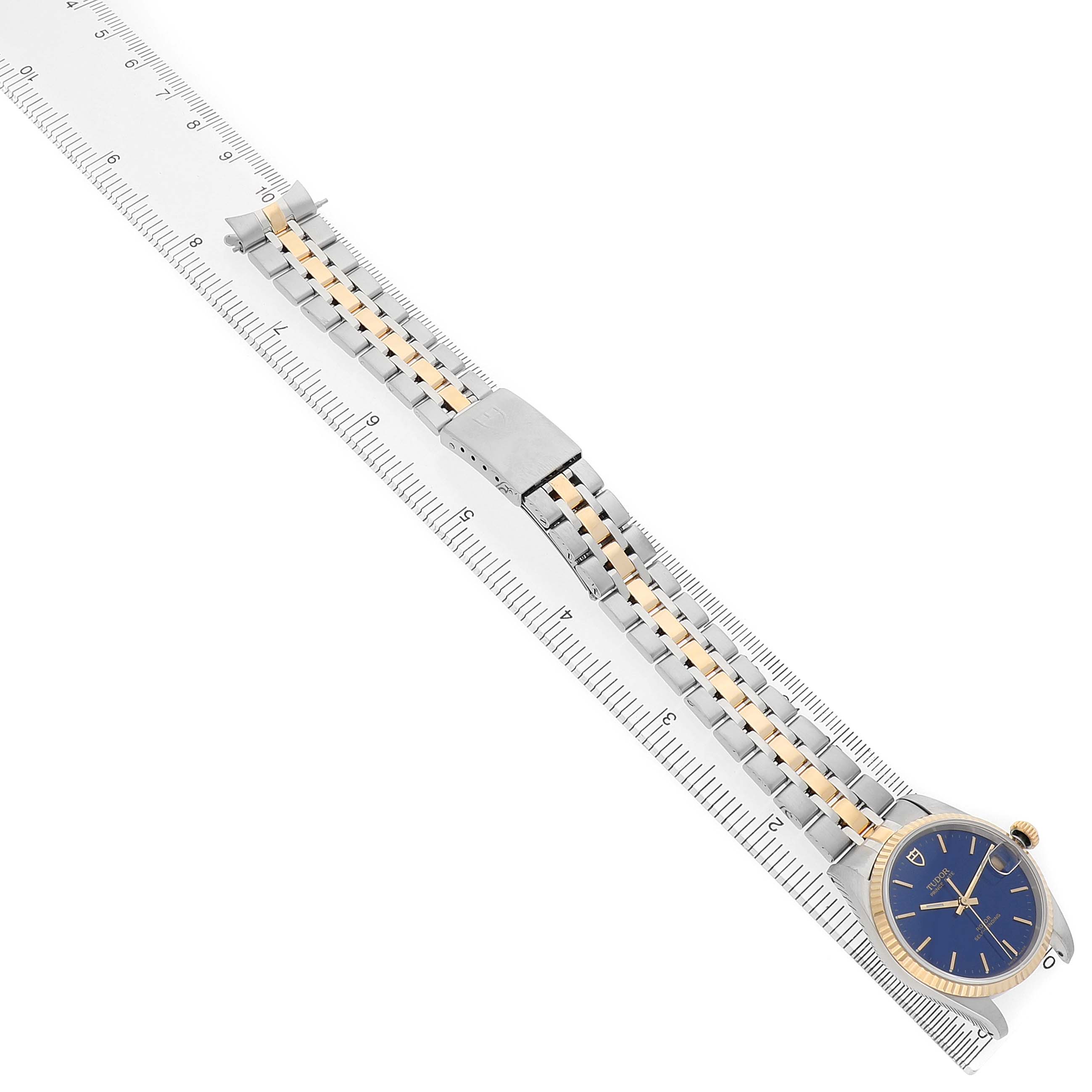 The Tudor Prince 72033 Men's Steel and Gold (two tone) Blue Dial model watch is shown in a diagonal angle, displaying the bracelet, clasp, and blue dial.
