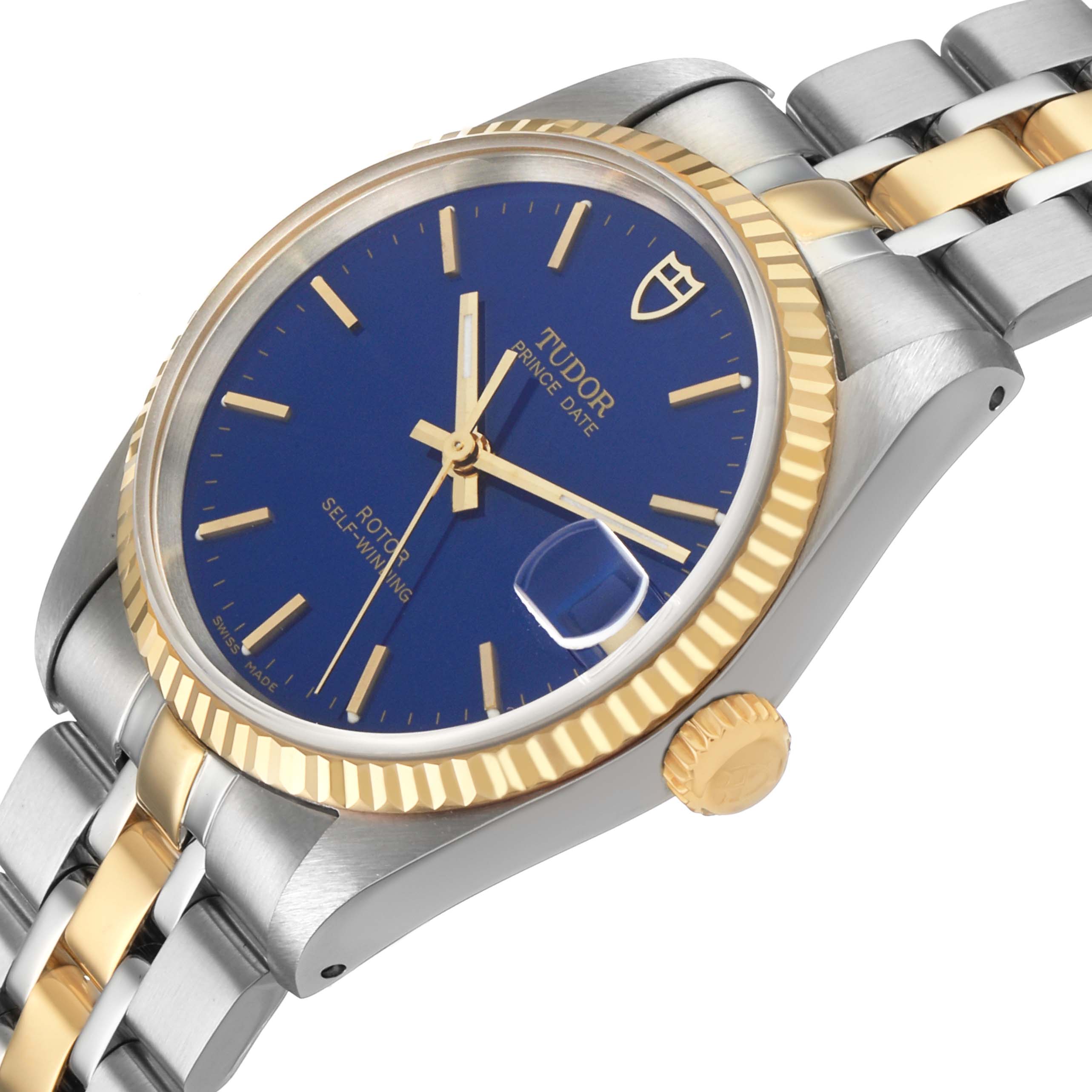 The Tudor Prince 72033 Men's Steel and Gold (two tone) Blue Dial watch is shown from a side angle, highlighting the blue dial, gold bezel, crown, and bracelet.