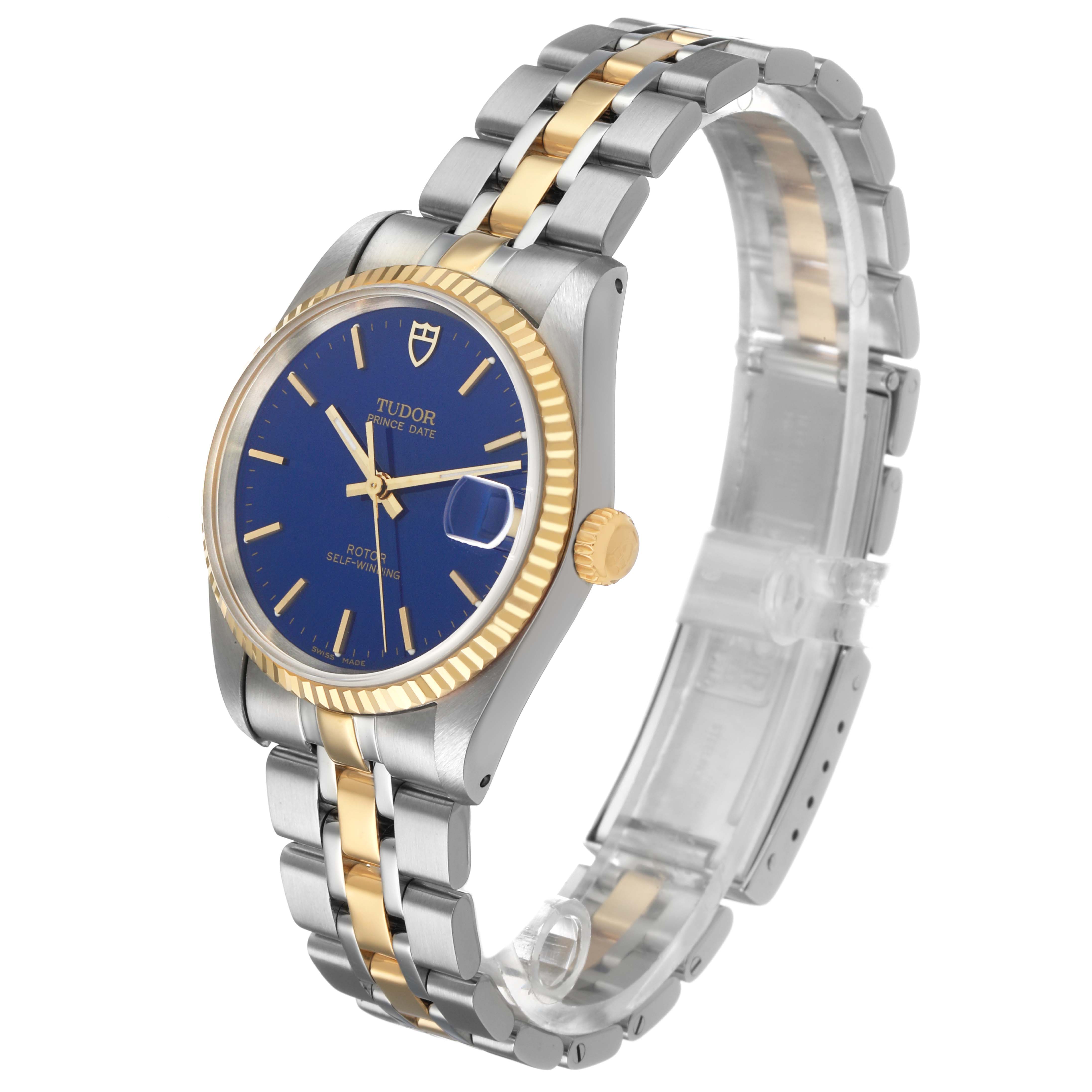 The Tudor Prince 72033 Men's Steel and Gold (two tone) Blue Dial model is shown at a three-quarter angle, revealing the face, bracelet, bezel, and crown.