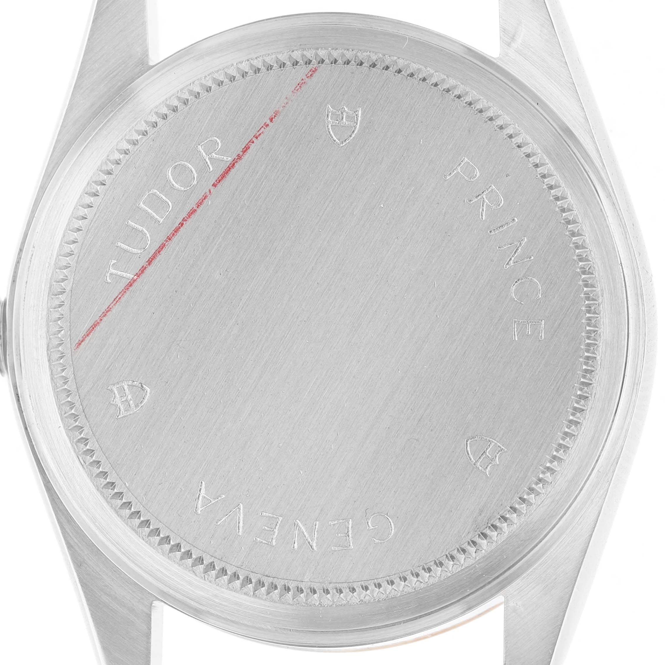 The image shows the back case of a Tudor Prince 72033 Men's Steel and Gold (two tone) Blue Dial watch viewed from above, highlighting the engraved details.