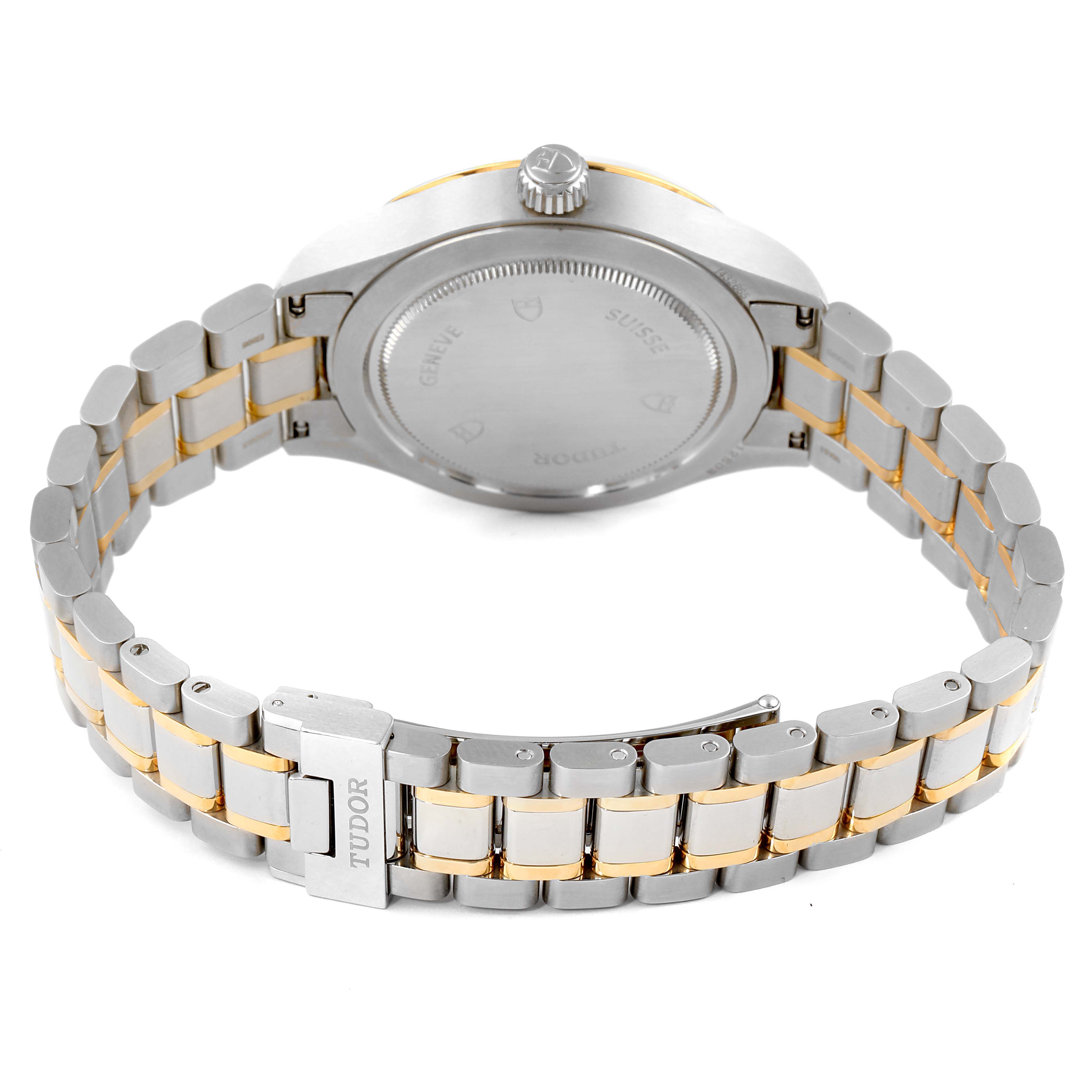 The image shows the back of the Tudor Style M12713-0003 Men's Steel and Gold (two tone) Silver Dial M12713-0003 Men's Steel and Gold (two tone) Silver Dial model watch, highlighting its case back and stainless steel bracelet with gold links.