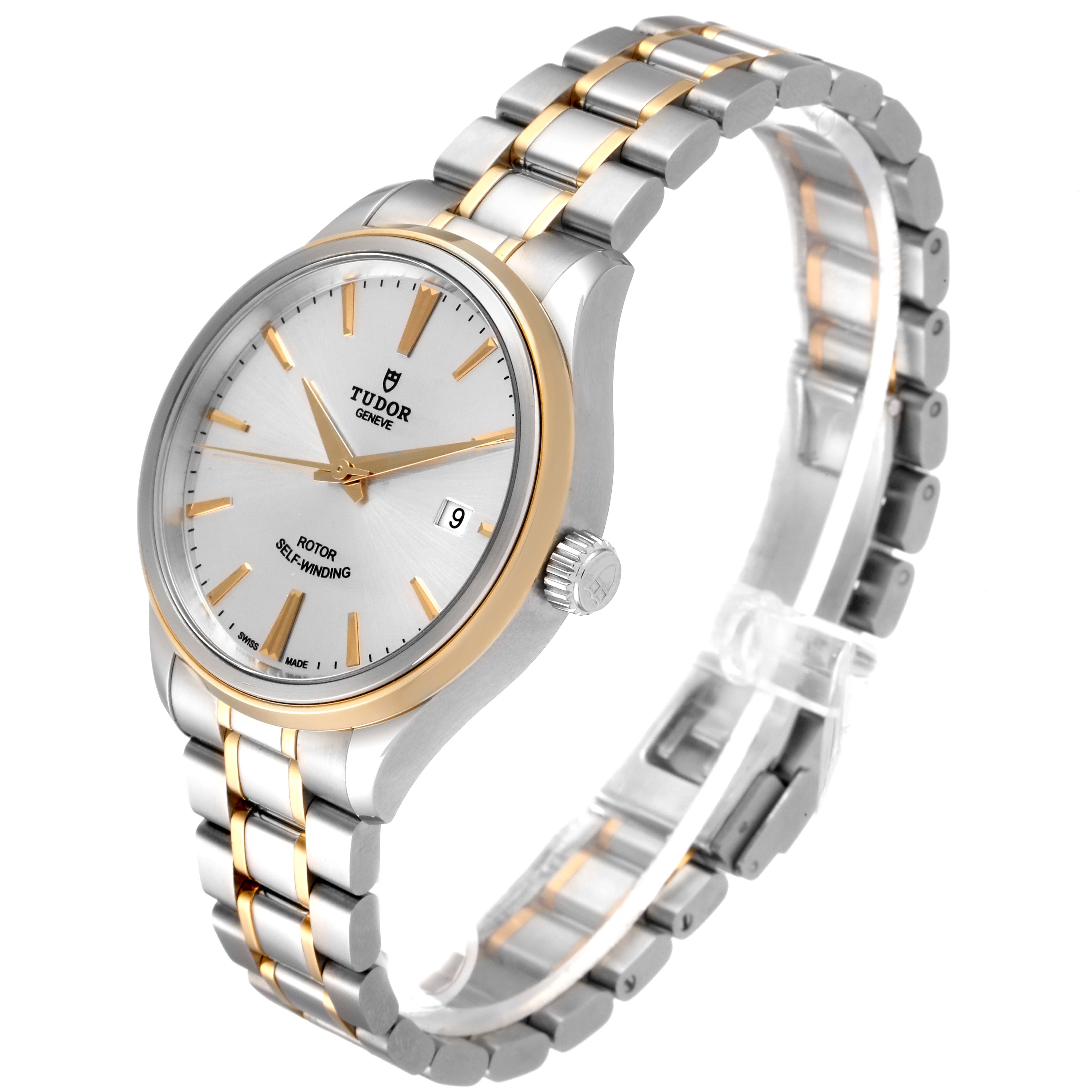The Tudor Style M12713-0003 Men's Steel and Gold (two tone) Silver Dial M12713-0003 Men's Steel and Gold (two tone) Silver Dial model watch is shown at a three-quarter angle, highlighting the face, bezel, crown, and bracelet.