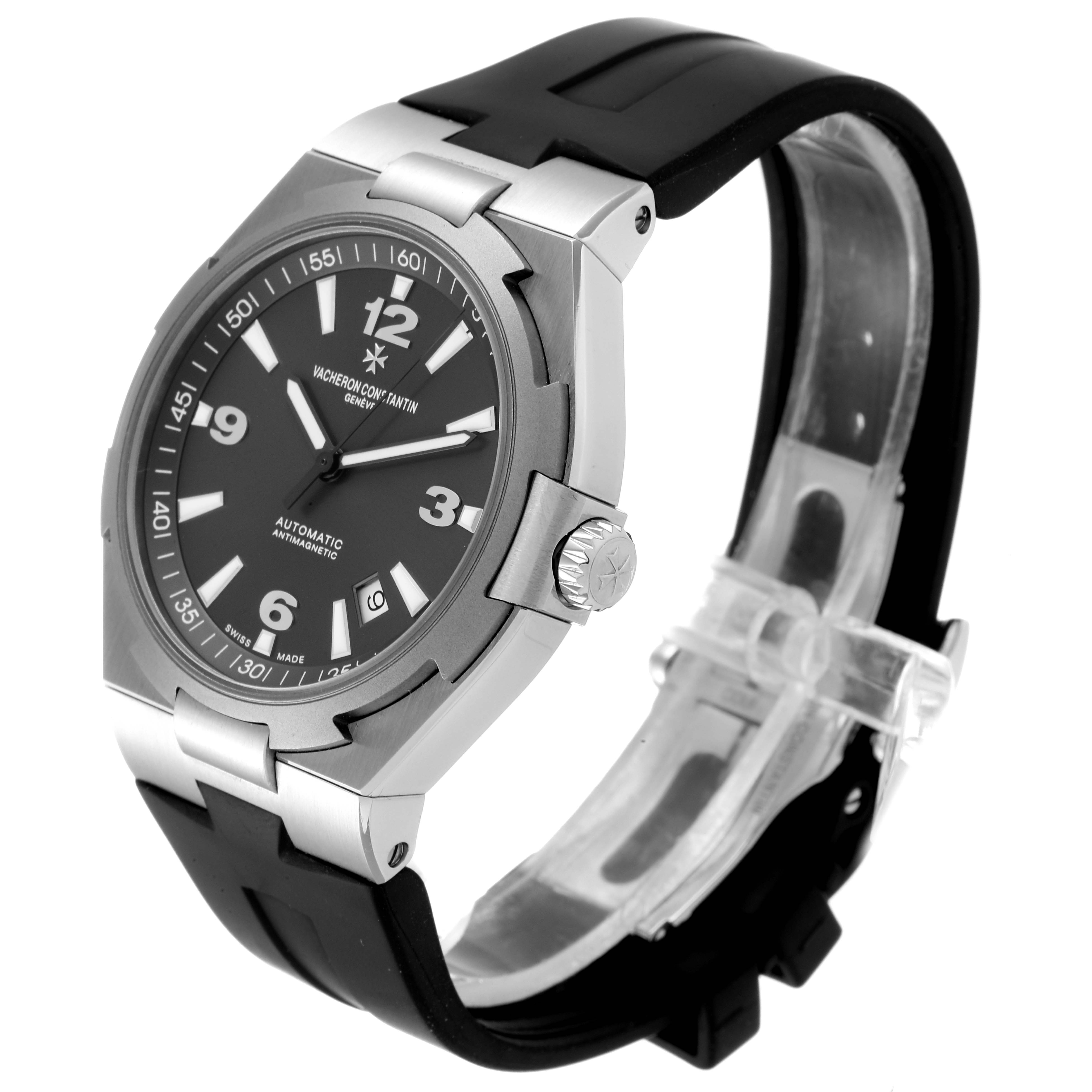 The Vacheron Constantin Overseas 47040/000W-9500 Men's Stainless Steel Black Dial 47040/000W-9500 Men's Stainless Steel Black Dial watch is shown at a three-quarter angle highlighting the face, bezel, crown, and strap.