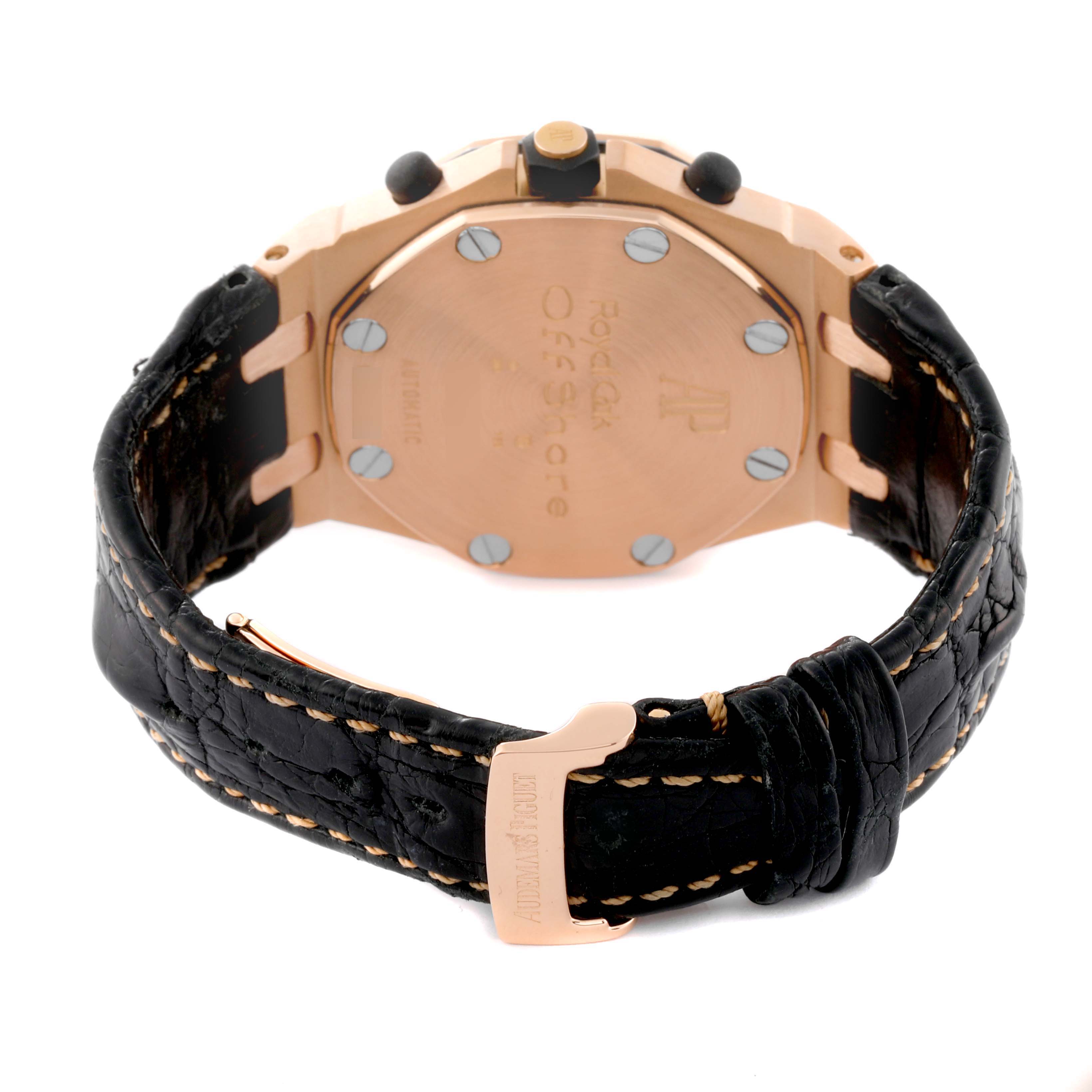 The image shows the case back and leather strap of an Audemars Piguet Royal Oak Offshore 2590OK.OO.D002CA.01 Men's Rose Gold Grey Dial 2590OK.OO.D002CA.01 Men's Rose Gold Grey Dial watch at an angle.