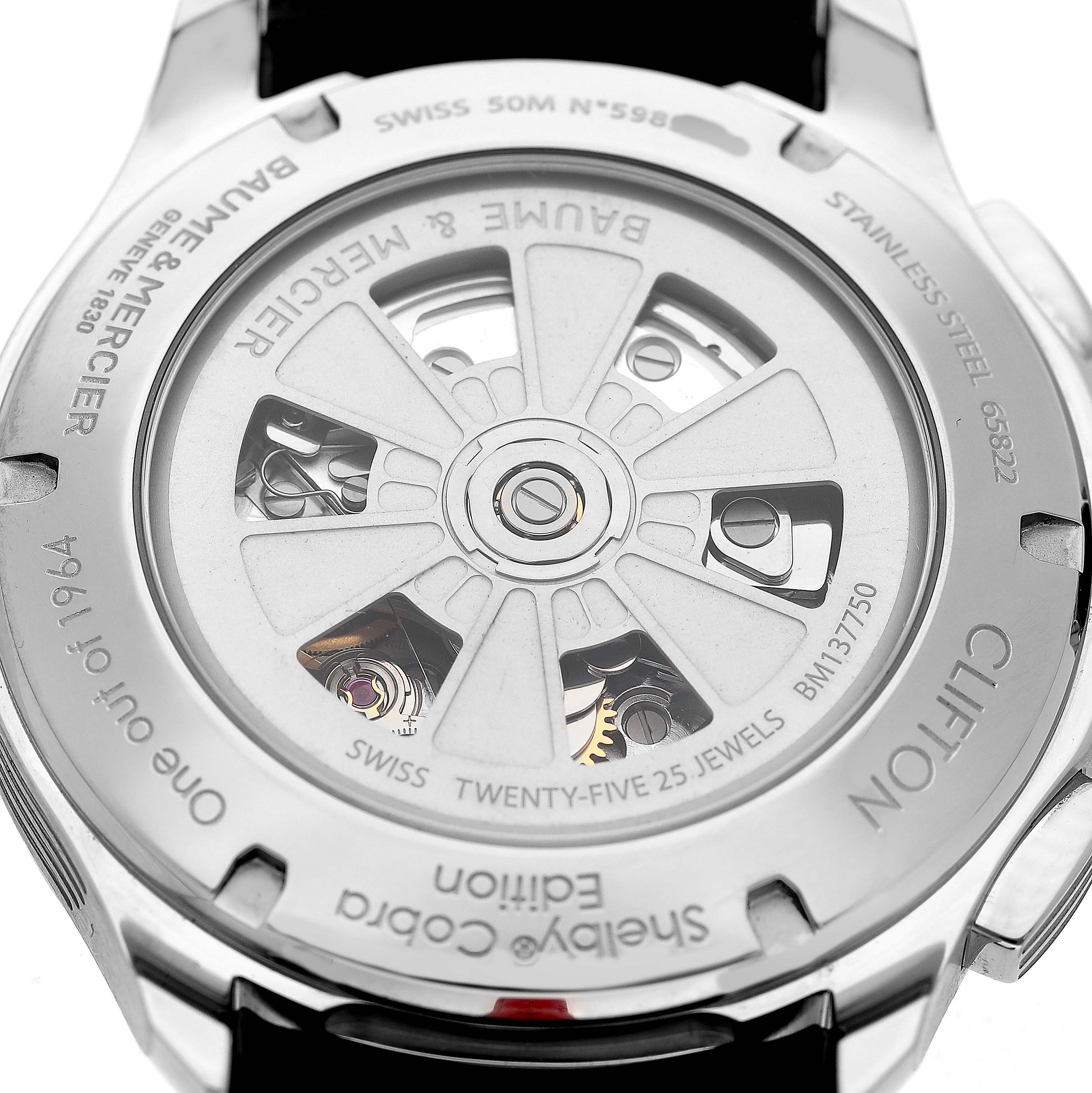 The image shows the back view of the Baume & Mercier Clifton 65822 Men's Stainless Steel Silver Dial watch, highlighting the movement and rotor.