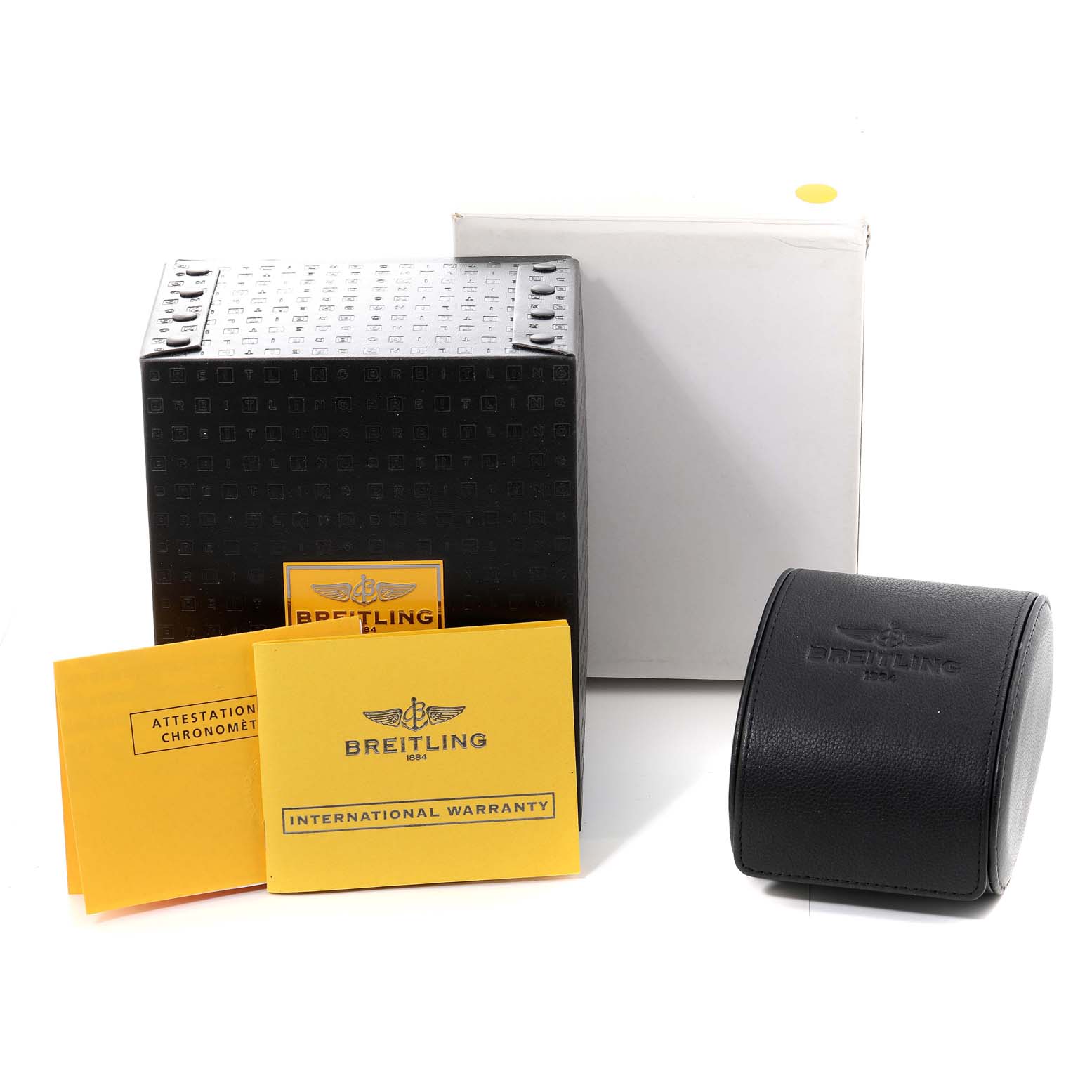 The image shows the packaging and accessories for a Breitling Avenger A17330 Men's Stainless Steel Black Dial A17330 Men's Stainless Steel Black Dial watch, including a box, watch case, and warranty cards.