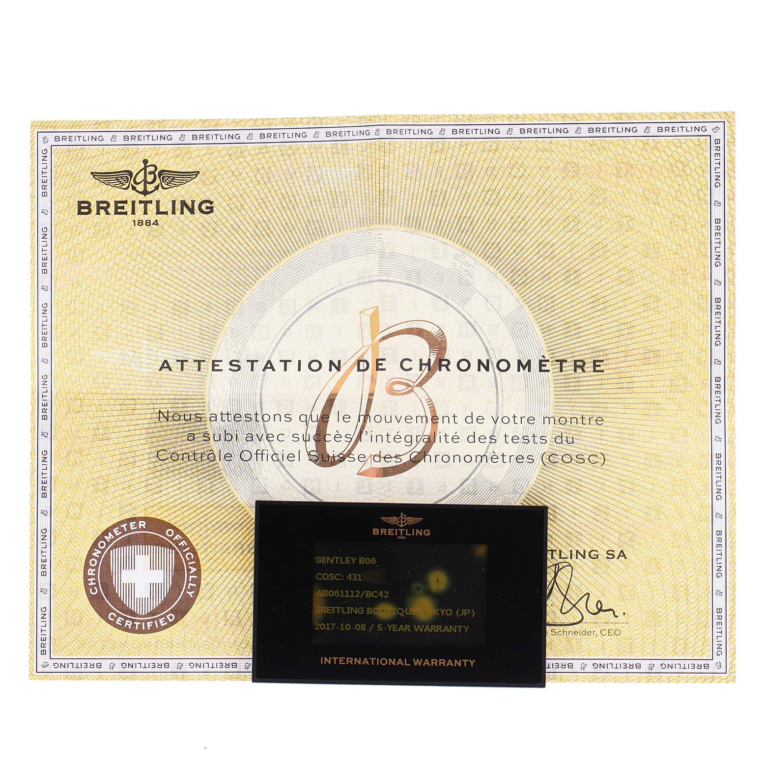 The image shows the Breitling Bentley AB061112.BD80.990A Men's Stainless Steel Black Dial AB061112.BD80.990A Men's Stainless Steel Black Dial model's chronometer certificate and international warranty card.