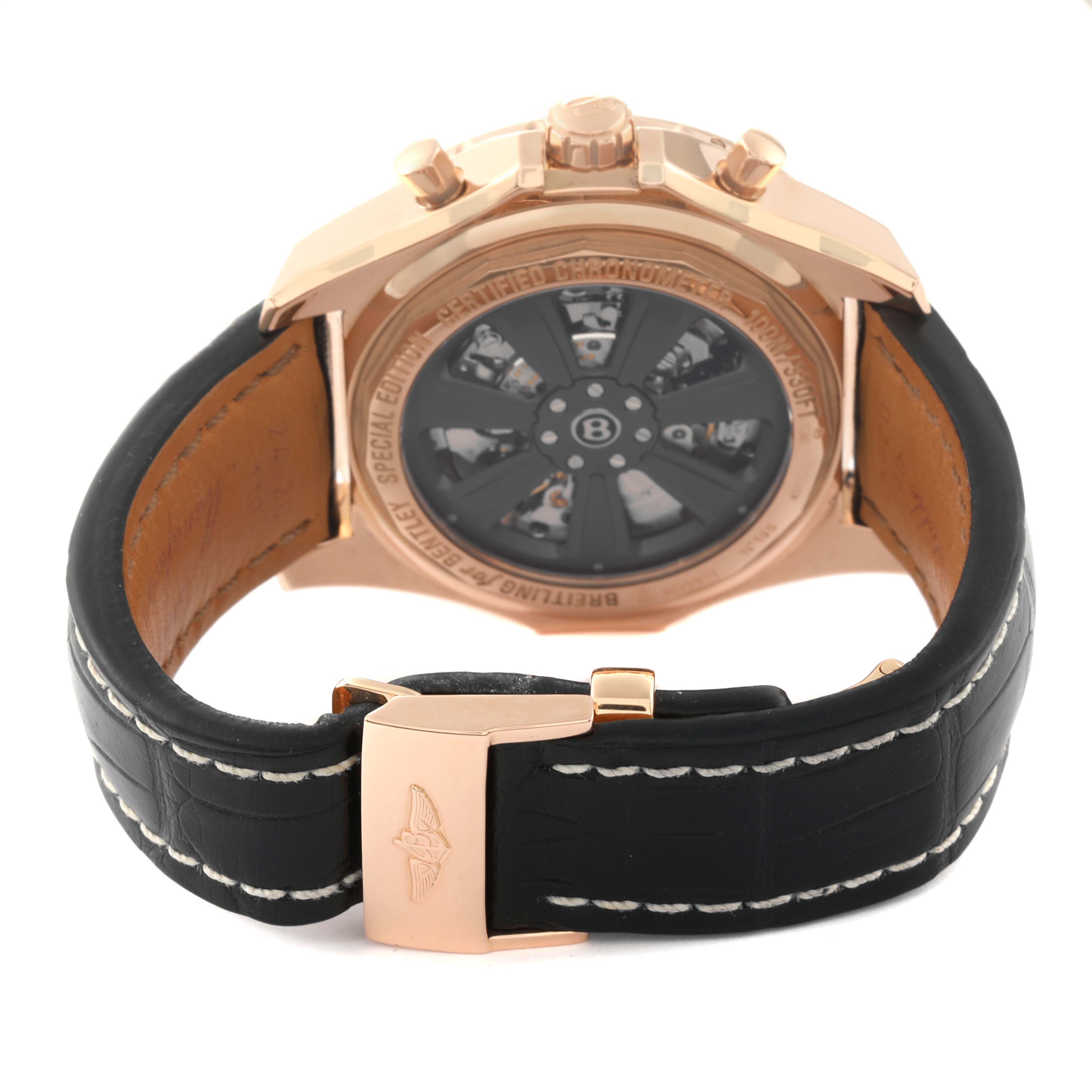 The image shows the back view of the Breitling Bentley RB061112/BC43 Men's Rose Gold Black Dial RB061112/BC43 Men's Rose Gold Black Dial watch, highlighting the rear case, mechanics, and leather strap.