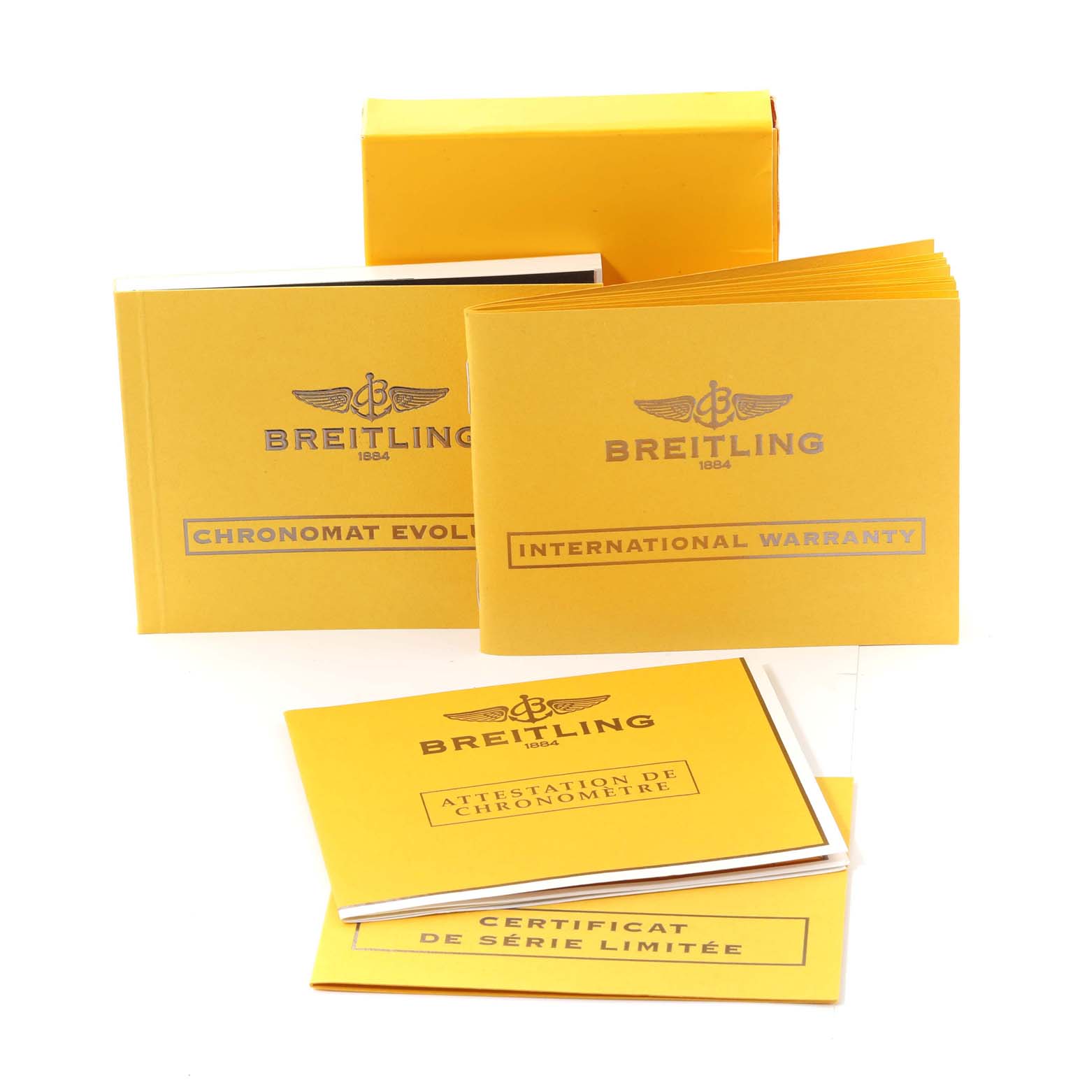 The image shows Breitling Chronomat A13356 Men's Stainless Steel Mother of Pearl Dial A13356 Men's Stainless Steel Mother of Pearl Dial model booklets and warranty documents, displayed angled and slightly fanned out.