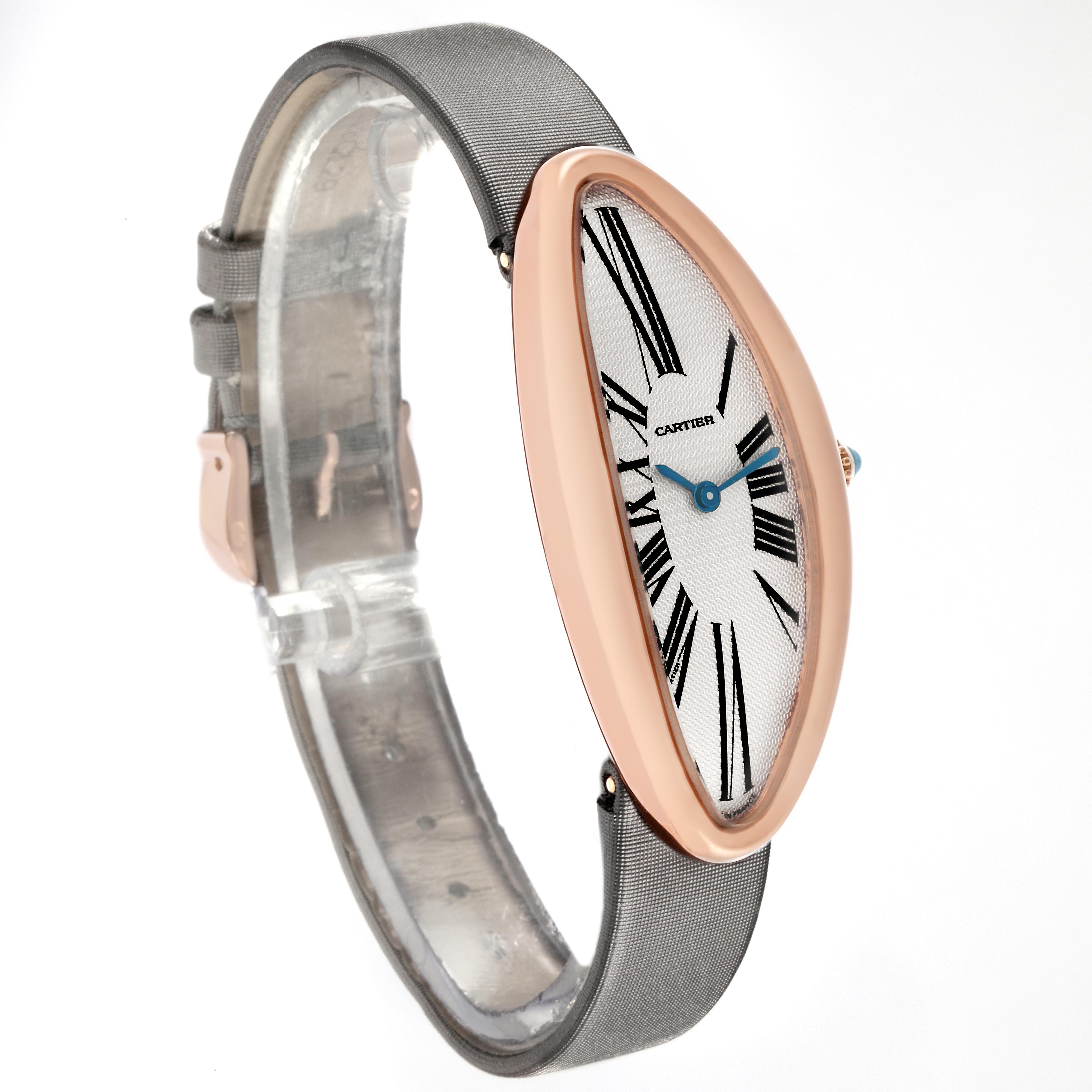 The Cartier Baignoire W1532256 Women's Rose Gold Silver Dial W1532256 Women's Rose Gold Silver Dial watch is shown at a side angle, highlighting its elongated oval face and strap.