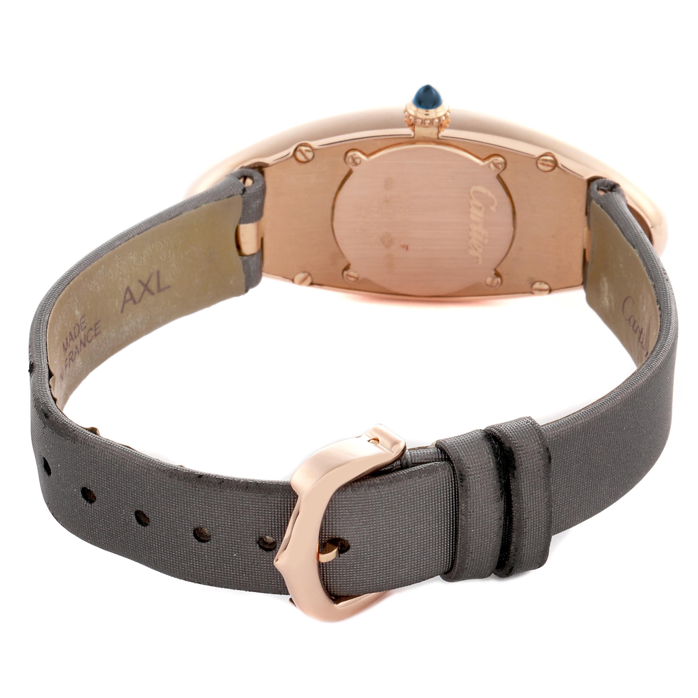 The Cartier Baignoire W1532256 Women's Rose Gold Silver Dial W1532256 Women's Rose Gold Silver Dial watch is shown from the back, displaying the case back, crown, and part of the band.