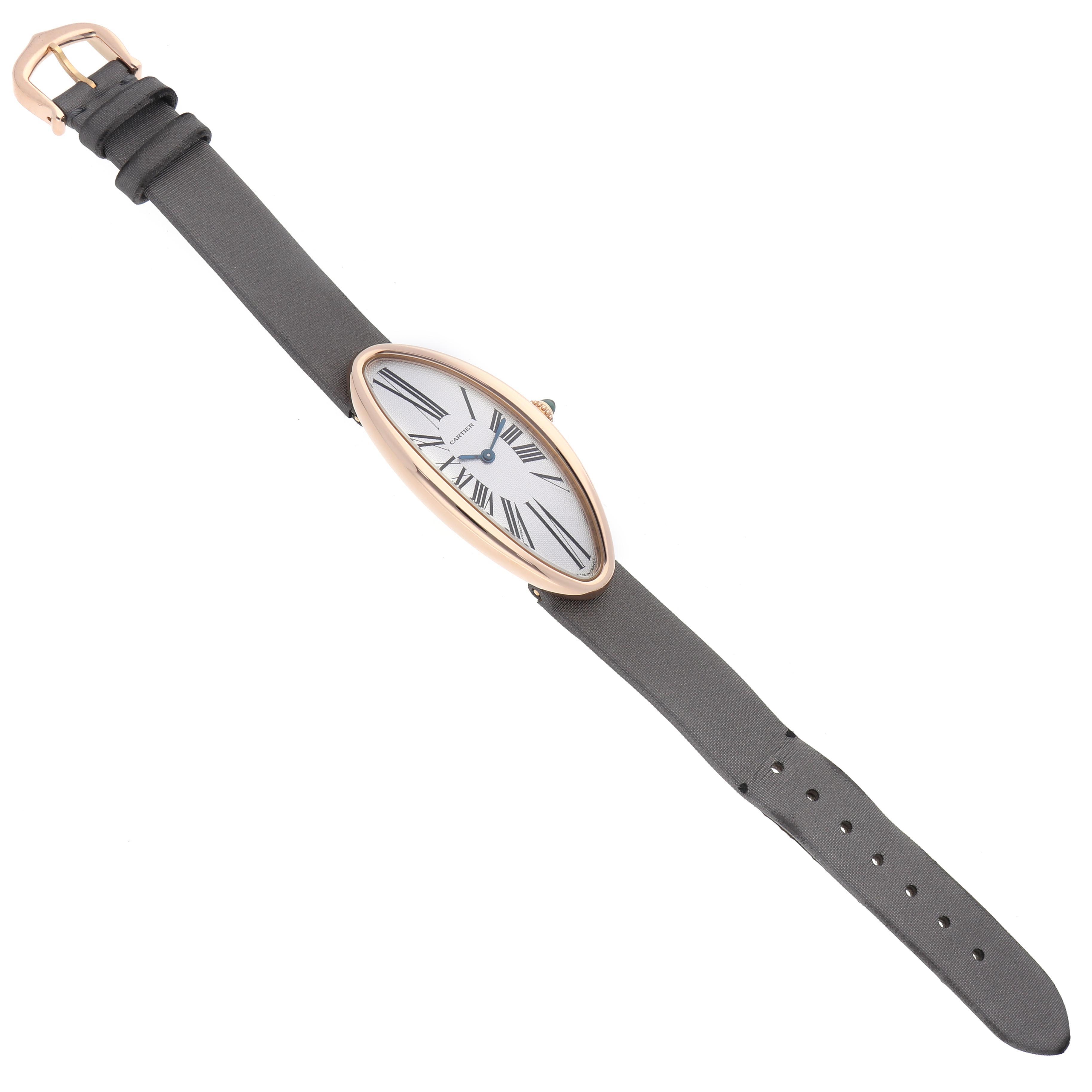 The Cartier Baignoire W1532256 Women's Rose Gold Silver Dial W1532256 Women's Rose Gold Silver Dial watch is shown from a top-down angle, highlighting its elongated oval face and leather strap.