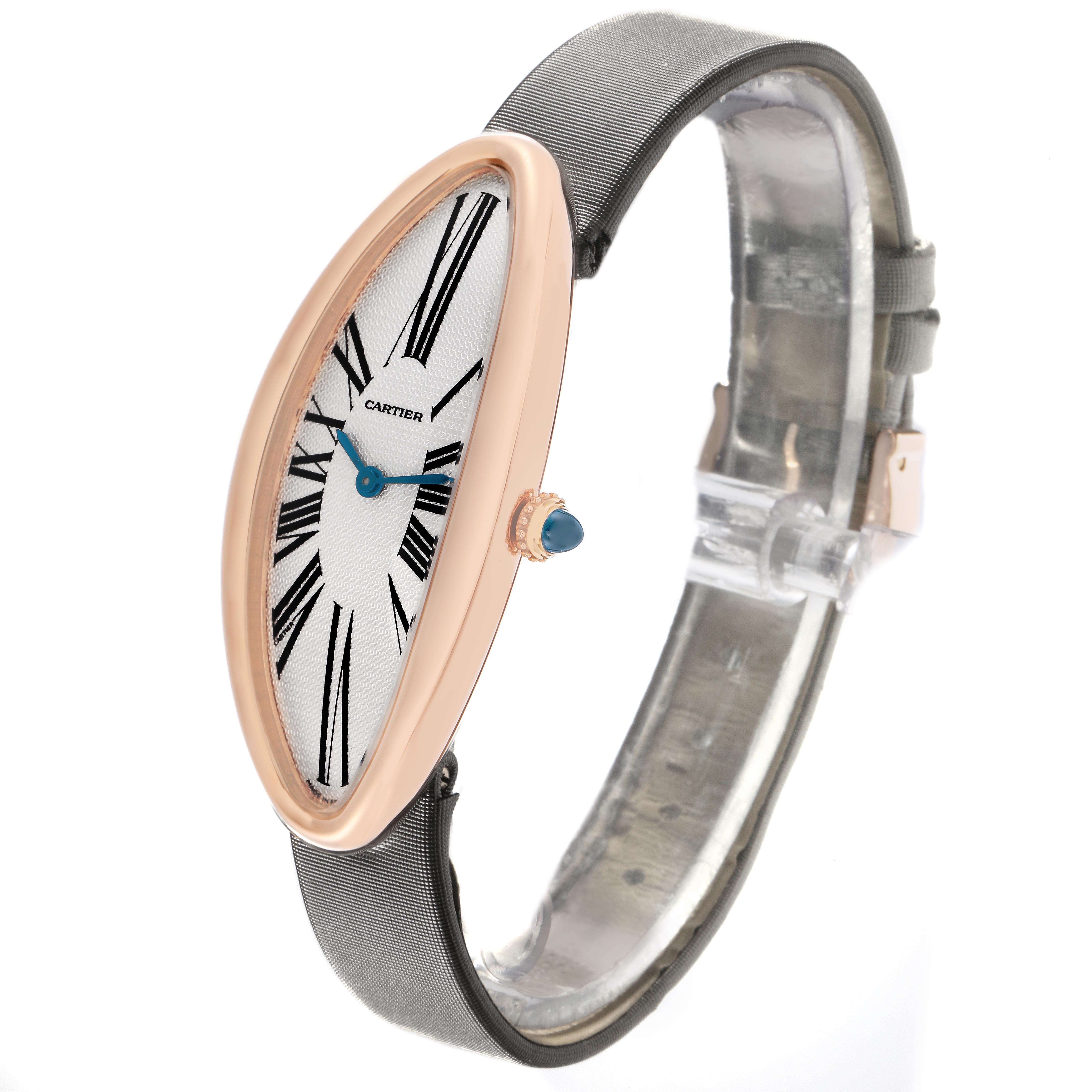 The Cartier Baignoire W1532256 Women's Rose Gold Silver Dial W1532256 Women's Rose Gold Silver Dial watch is shown at a side angle, highlighting its elongated oval face, Roman numerals, and sleek band.