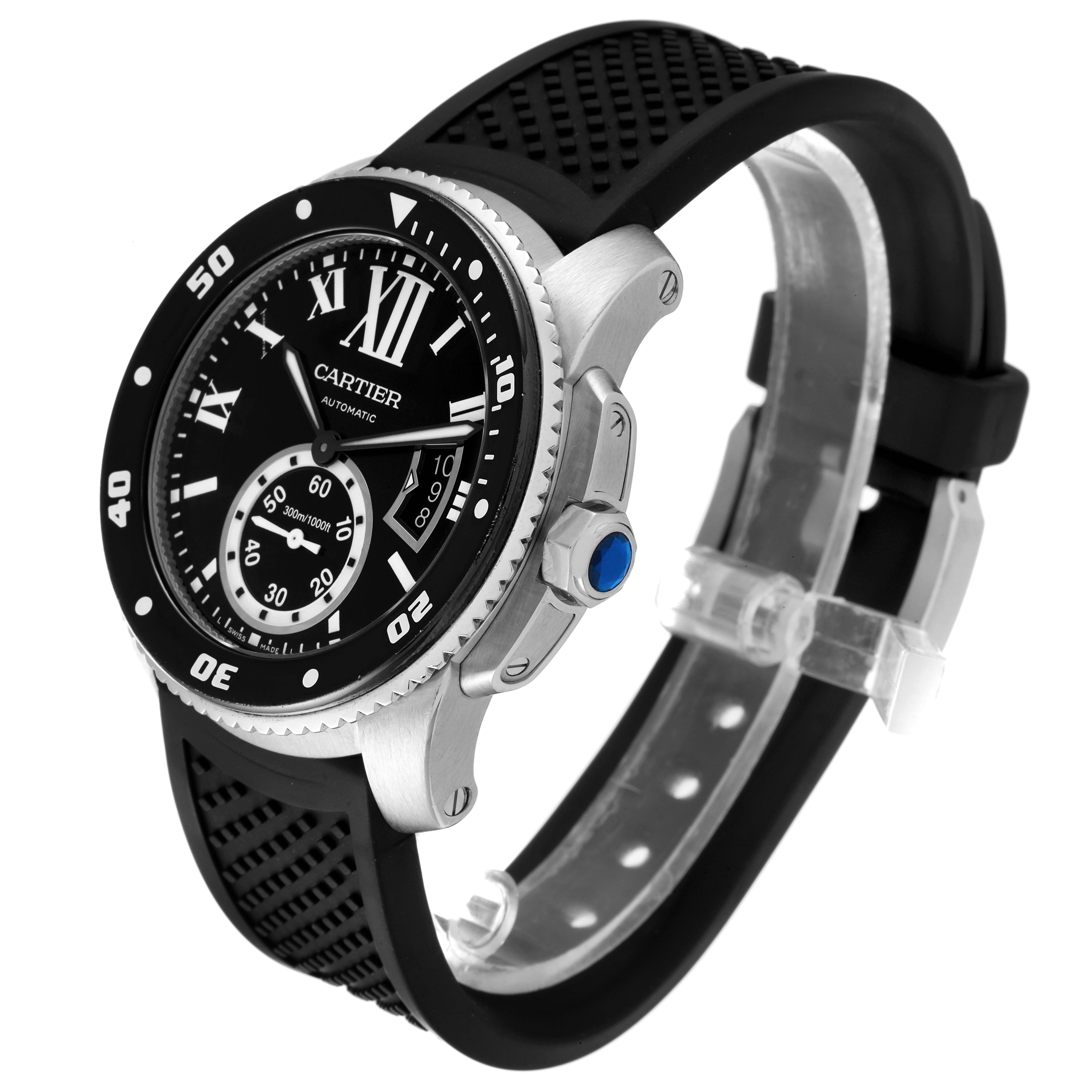 The Calibre de Cartier watch by Cartier is shown at a three-quarter angle displaying the bezel, dial, crown, and rubber strap.