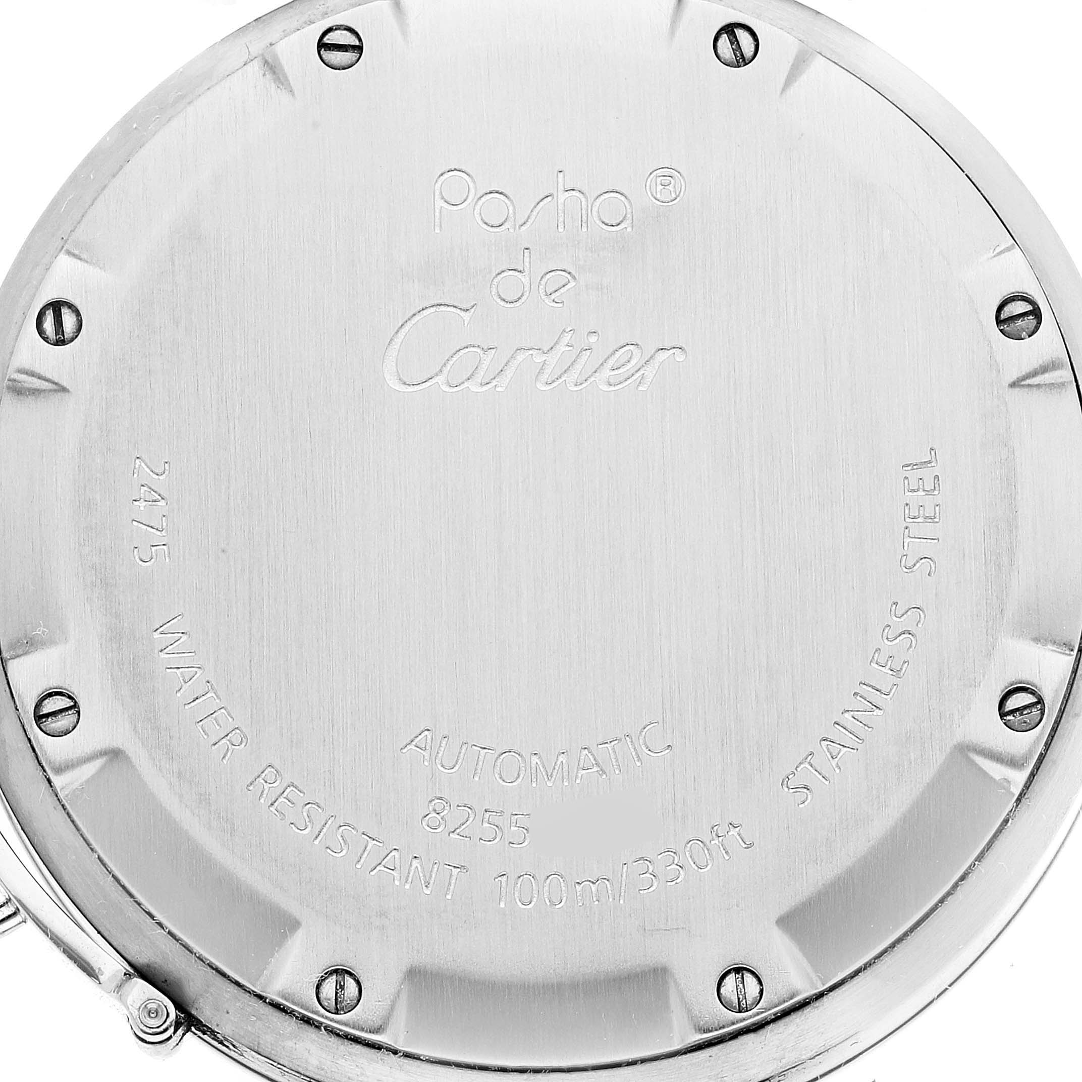 The image shows the back case of a Cartier Pasha W31058M7 Women's Stainless Steel Pink Dial W31058M7 Women's Stainless Steel Pink Dial model watch, displaying engravings and screws.