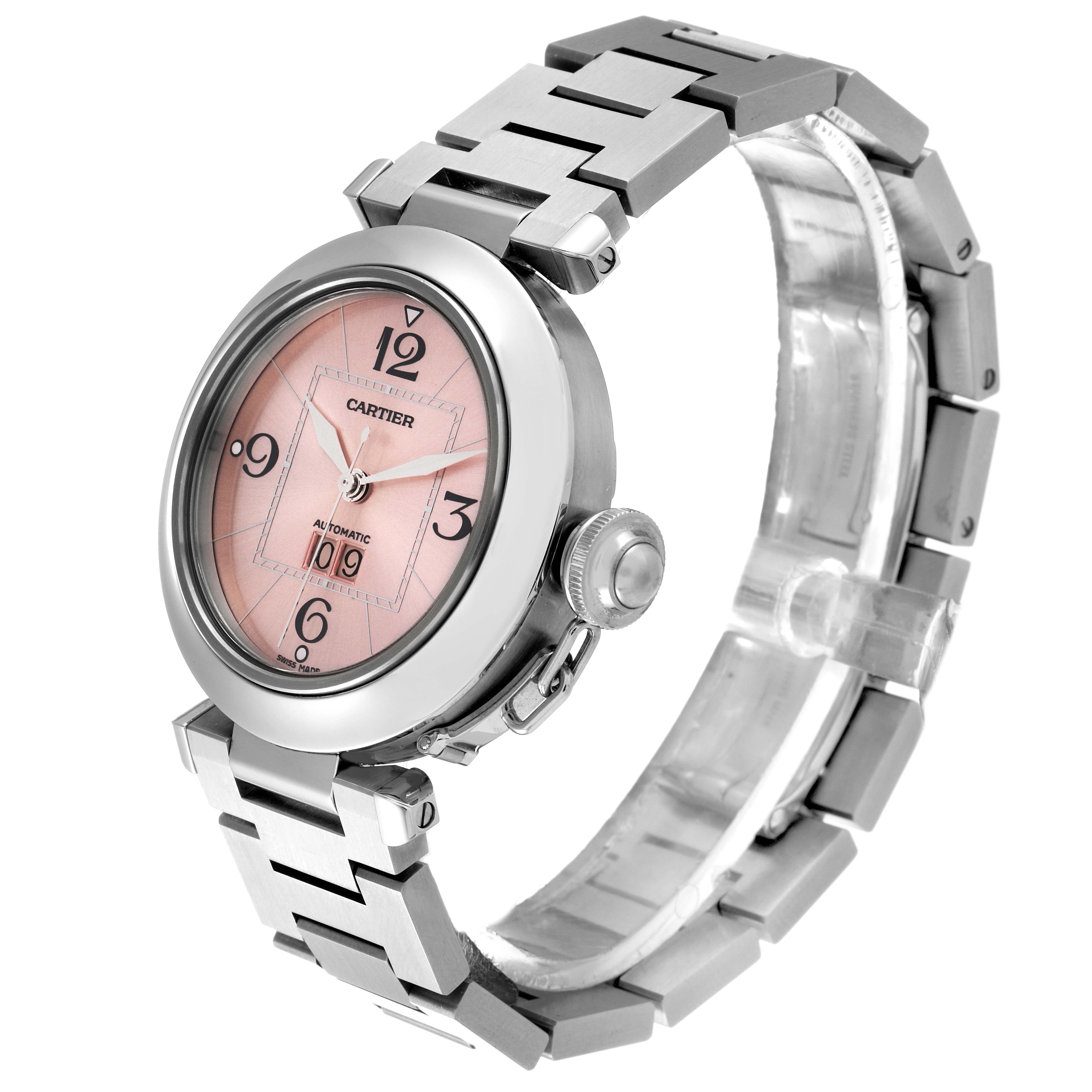 The image shows a side angle of the Cartier Pasha W31058M7 Women's Stainless Steel Pink Dial W31058M7 Women's Stainless Steel Pink Dial watch, highlighting its round face, pink dial, and metal bracelet.