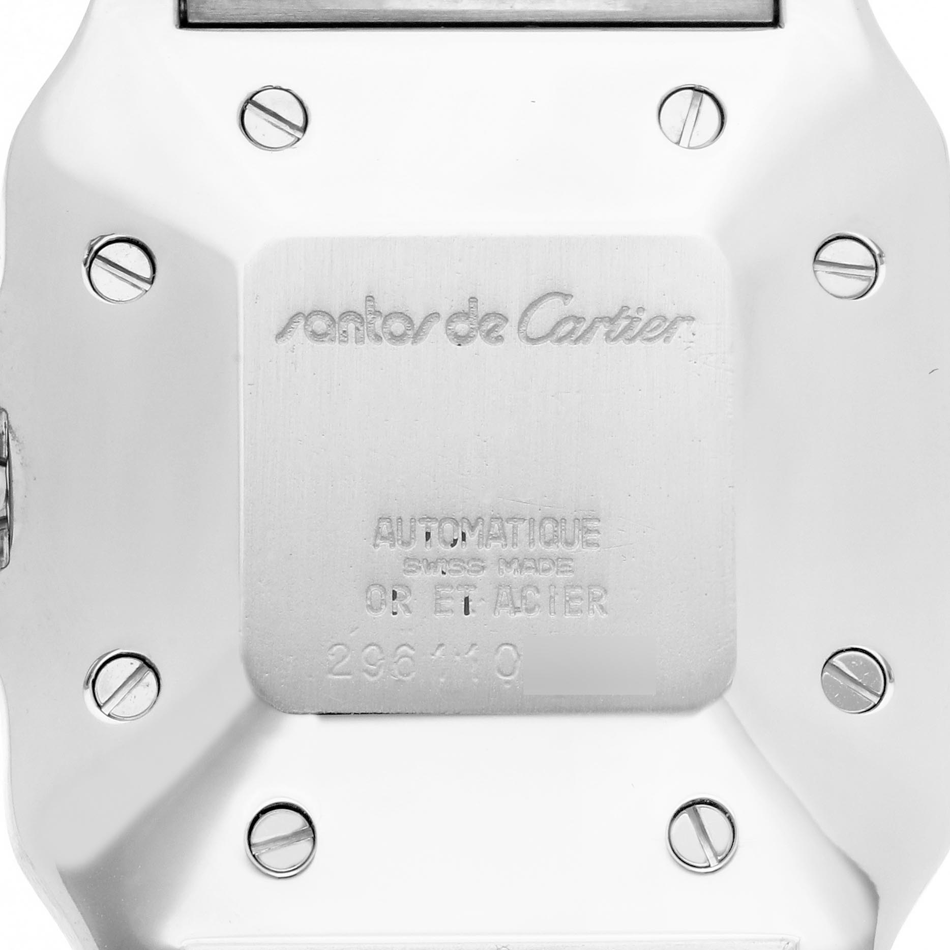 The image shows the back of a Cartier Santos 81036288 Men's Steel and Gold (two tone) White Dial 81036288 Men's Steel and Gold (two tone) White Dial watch, highlighting the screws and engravings on the case.