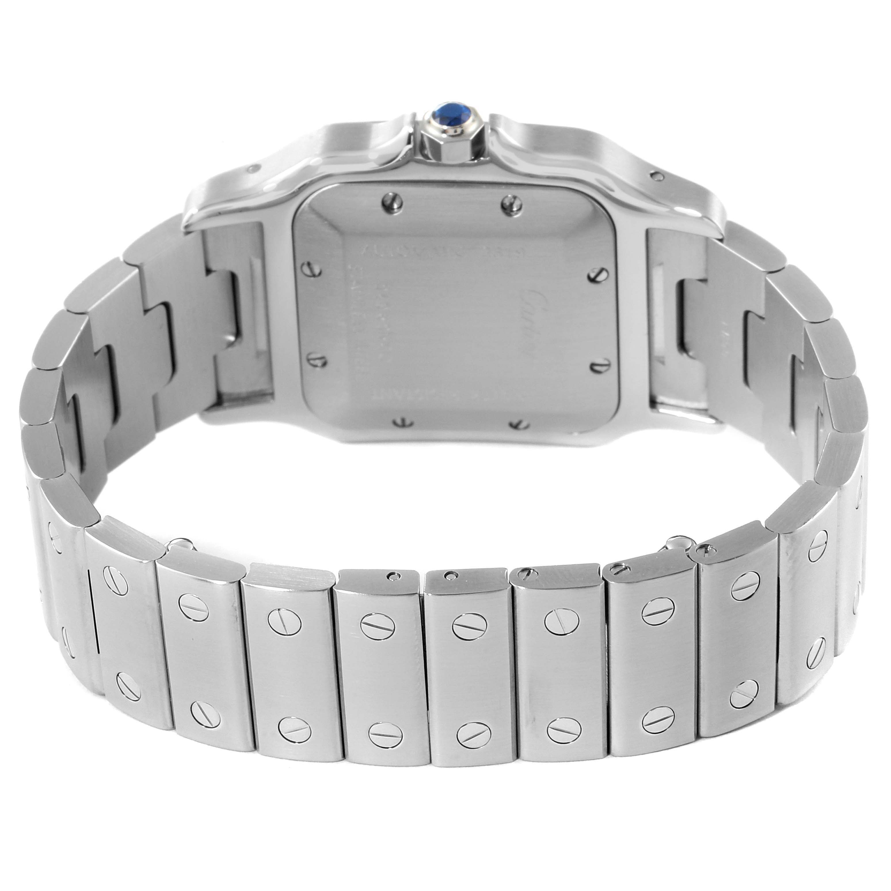 The image shows the back view of the Cartier Santos W20055D6 Men's Stainless Steel Silver Dial W20055D6 Men's Stainless Steel Silver Dial watch, highlighting its stainless steel case and bracelet with screw details.