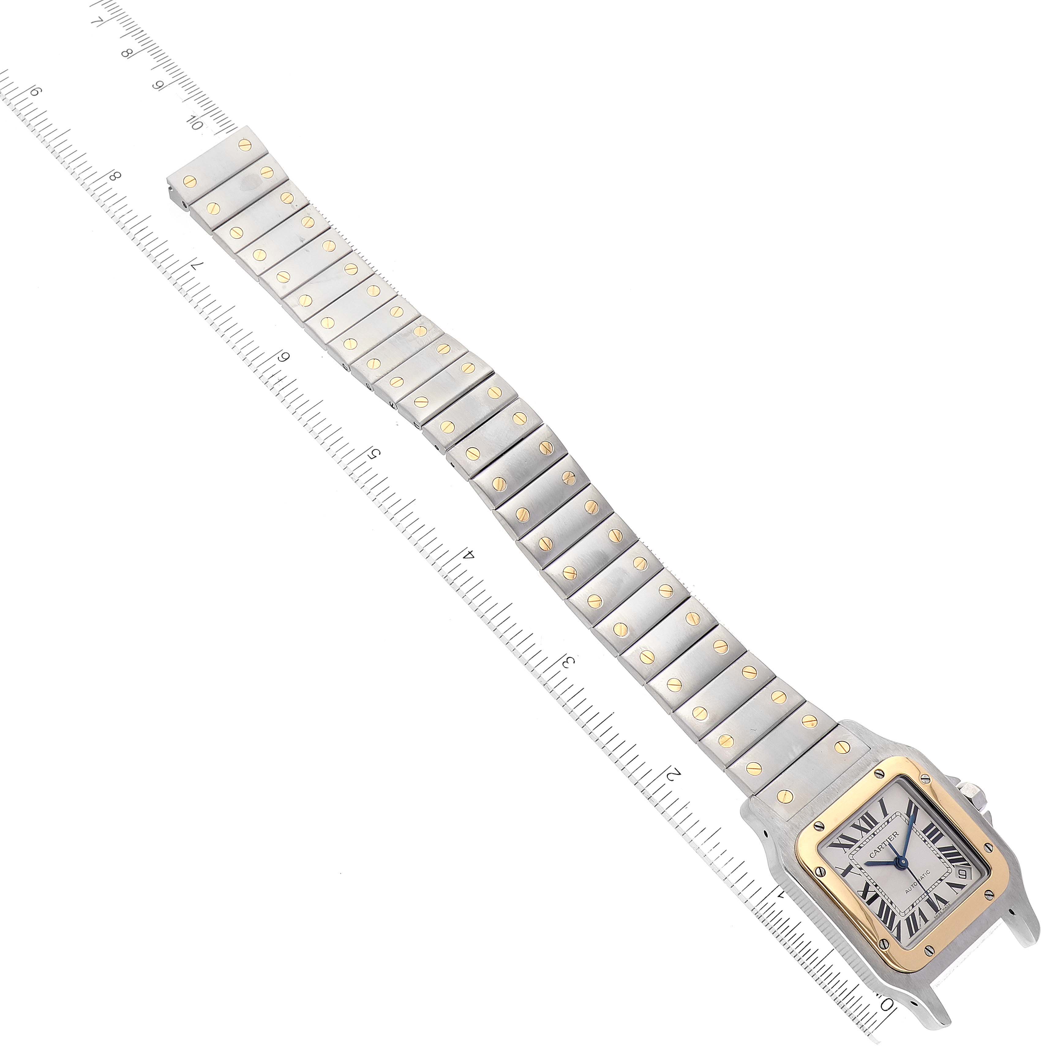 The image shows a Santos model by Cartier watch at a top-down angle, highlighting the face, bezel, and full bracelet.
