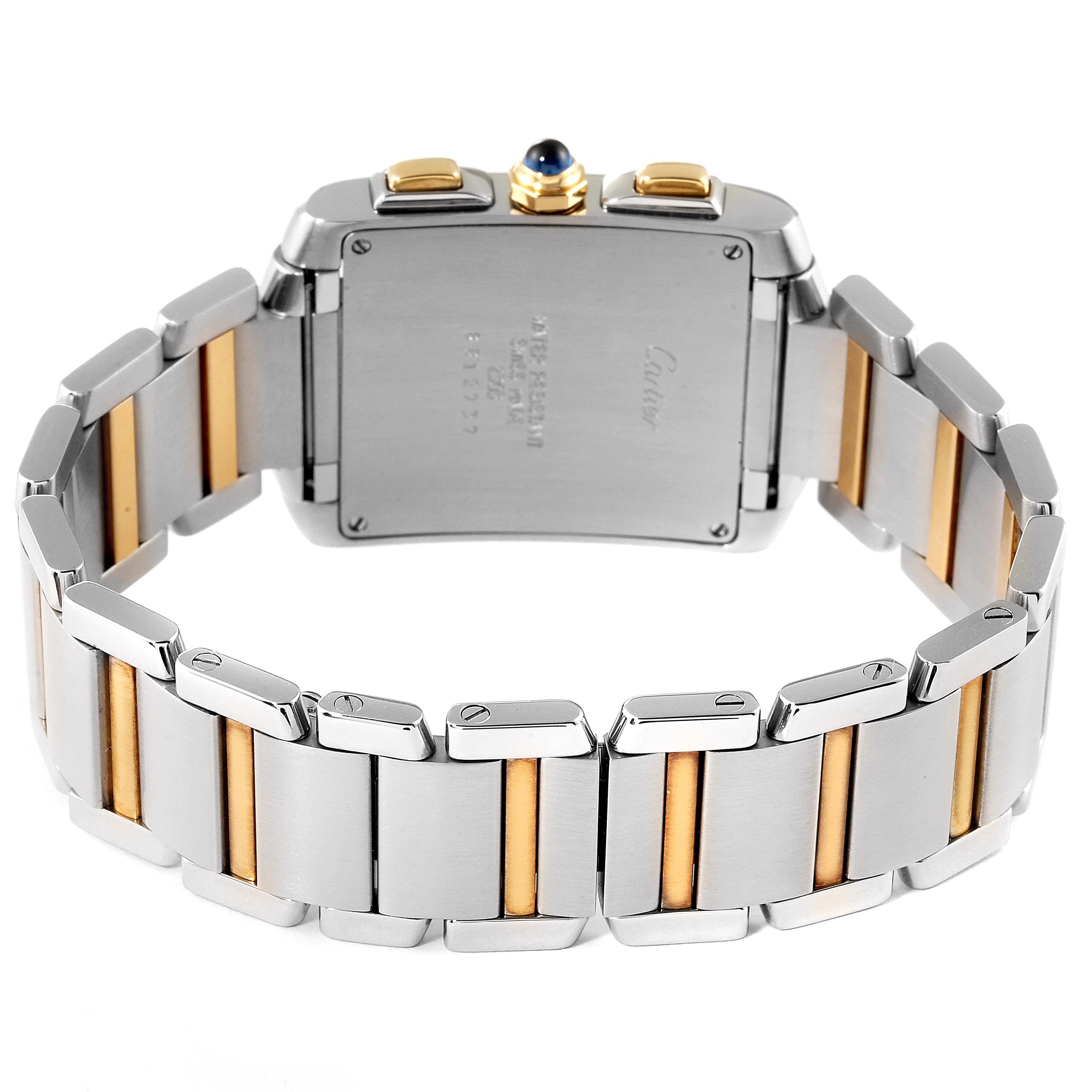The image shows the back of a Cartier Tank Française watch, highlighting the case back and gold-accented stainless steel bracelet.