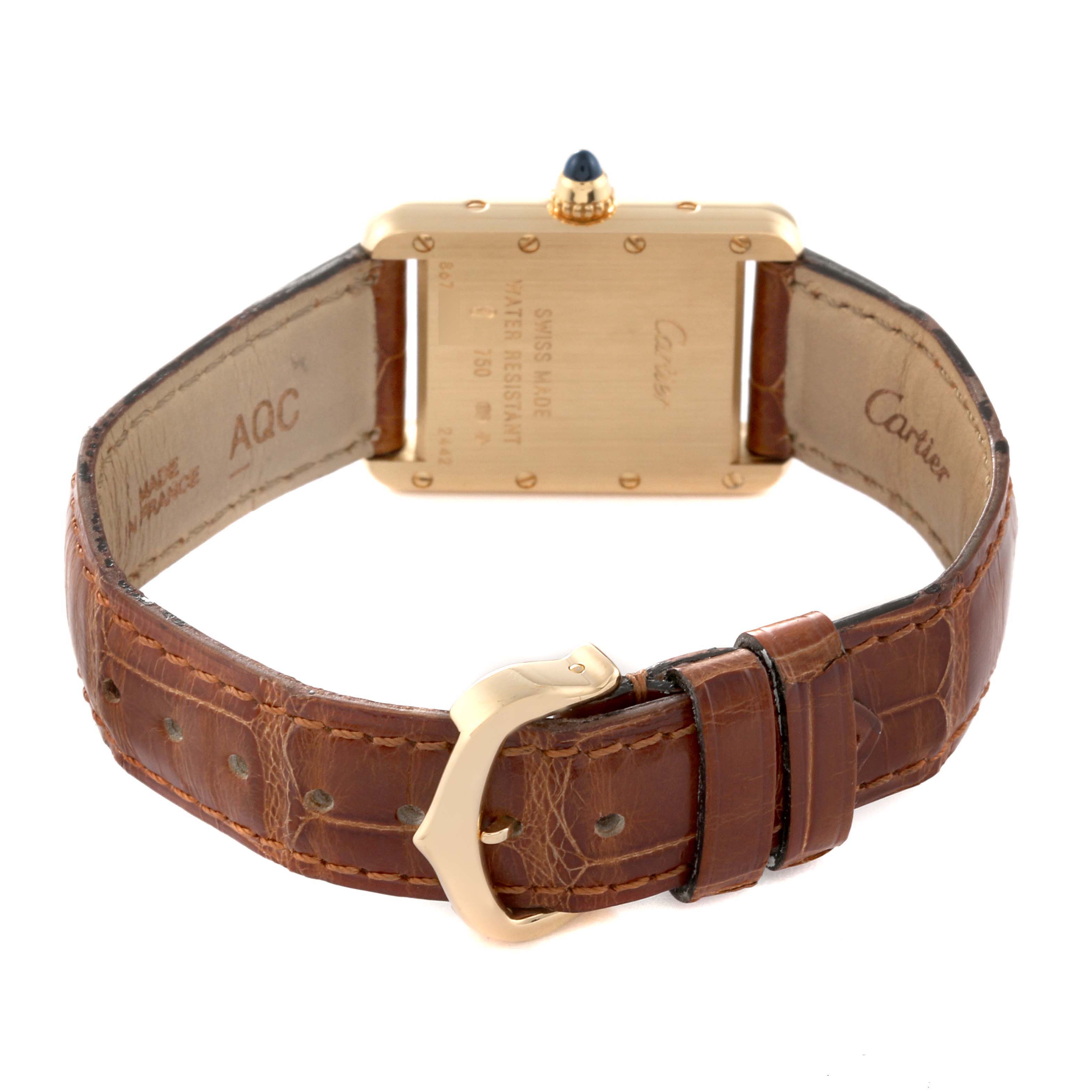 The image displays the back side of a Cartier Tank Louis W1529856 Women's Yellow Gold Silver Dial W1529856 Women's Yellow Gold Silver Dial watch, including its leather strap and buckle.