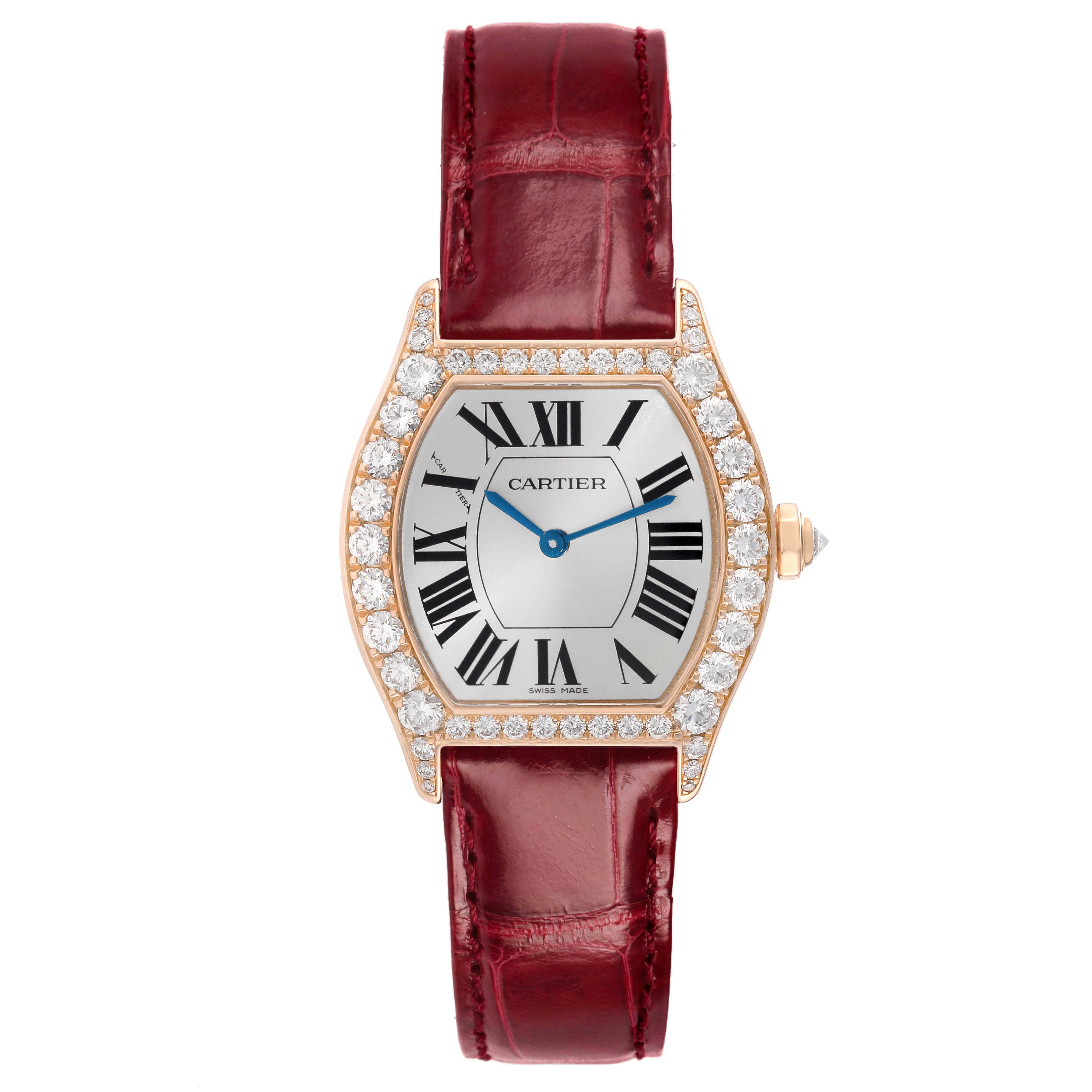 The Cartier Tortue WA507031 Women's Rose Gold Silver Dial watch is shown from a top-down angle, highlighting its dial, bezel with diamonds, and red leather strap.